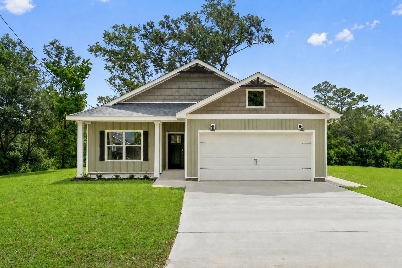 Seller contributes toward purchaser's closing costs and/or concessions with an acceptable offer. Situated on an impressive wooded homesite approximately 305 feet deep close to everything Pensacola has to offer. Welcome to this beautifully crafted, Craftsman-inspired single-family home that perfectly combines timeless style with today's modern conveniences. Offering 1,600 square feet of thoughtfully designed living space, this 3-bedroom, 2-bathroom gem is ideally located just minutes from the interstate, top-rated hospitals, shopping centers, and a wide variety of restaurants--offering unbeatable convenience in a sought-after area. Step inside to an inviting open-concept floor plan that seamlessly connects the living, dining, and kitchen areas--ideal for entertaining or everyday living. Soaring vaulted ceilings with custom cypress wood beams bring warmth and character to the spacious living room. The chef's kitchen is sure to impress, featuring stainless steel appliances, a gas range, quartz countertops, soft-close cabinetry, and a butler's pantry for added storage and prep space. Nine-foot ceilings throughout the home enhance the sense of openness and light. Retreat to the luxurious master suite, where the spa-like bathroom offers a freestanding soaking tub, a beautifully tiled walk-in shower, and elegant finishes that create a serene escape. A tankless water heater ensures you'll always have hot water when you need it. enormous backyard provides endless possibilities whether