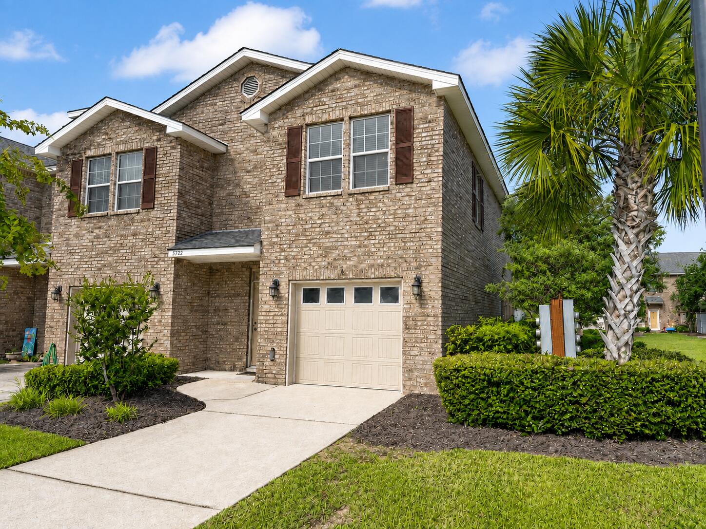 Welcome to carefree living in this all brick end unit townhome on Navarre's east side. The main level features a spacious living area, convenient half bath, and oversized one car garage. Upstairs, you'll find three generously sized bedrooms and two full bathrooms. Enjoy a fenced backyard along with community amenities that include grounds maintenance, a swimming pool, children's playground, and pet waste stations. Ideally located near Hurlburt Field, Navarre Beach, area schools, shopping, and dining. Washer and dryer also convey.