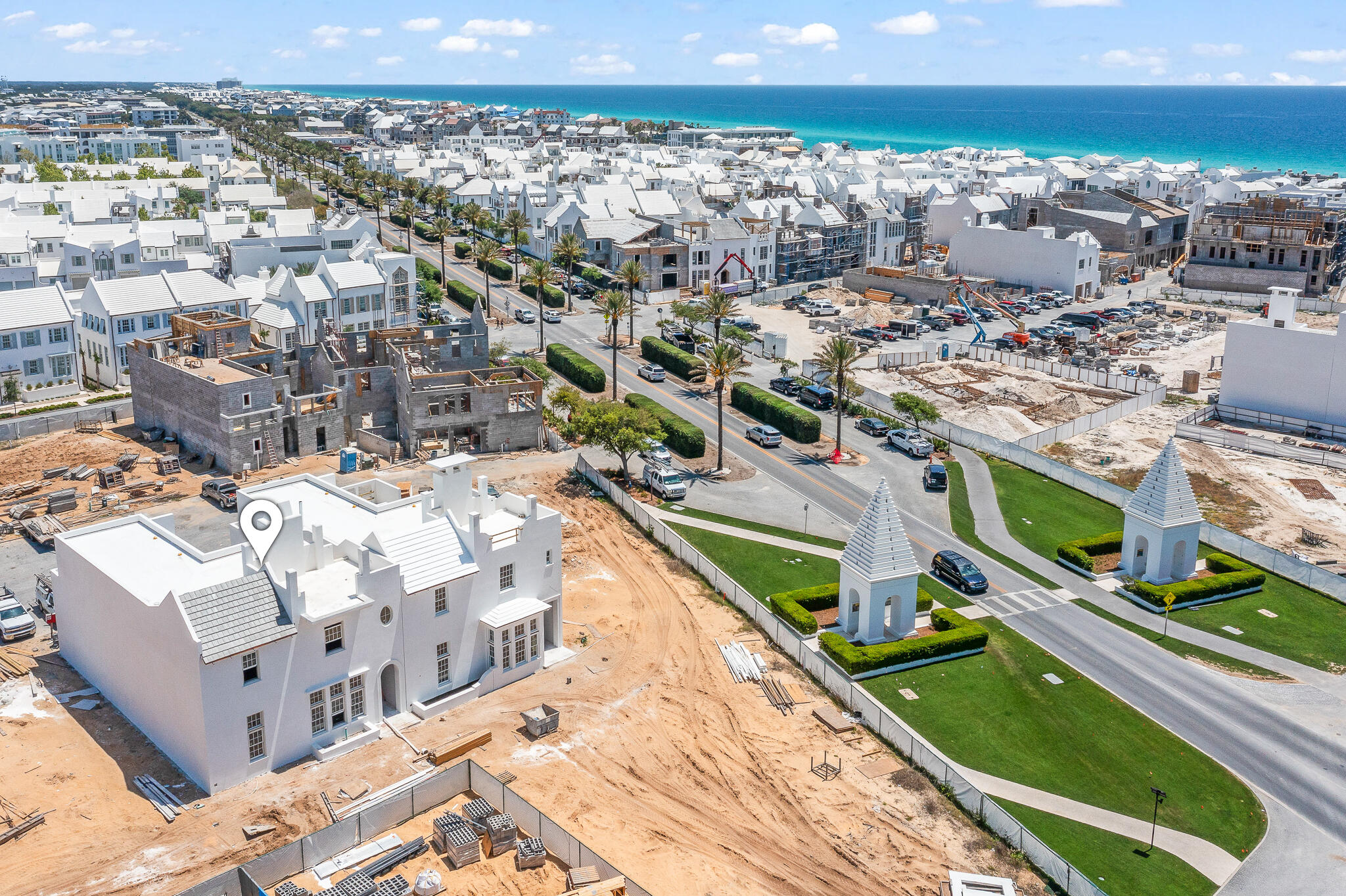 Designed by Gary Justiss, this 4-bedroom, 4 full bath, 2 half bath home offers 3,138 square feet of well-planned living space in one of Alys Beach's most desirable areas. On the first floor, the living room and kitchen open directly to a covered outdoor living area, creating a seamless indoor-outdoor flow. This space includes a summer kitchen, dining area, and adjacent to the outdoor courtyard with private pool with stairs to a second floor private terrace. A large Primary Bedroom & Bath are prominently positioned on the first floor.  
The second floor offers a sitting area with beverage center that connects to a second outdoor living space. A secondary Primary Bedroom & bath anchor the second floor.  Adjacent to the Sitting Area a stairwell delivers you to a third-floor rooftop terrace.
