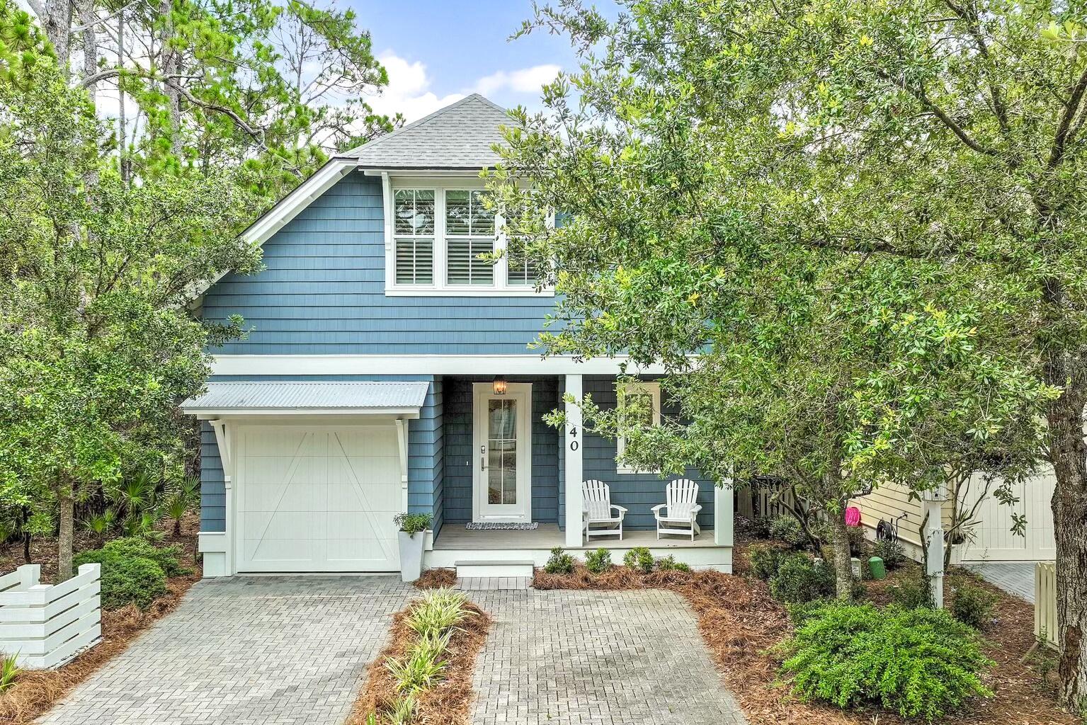 Rare opportunity to own the largest cottage style home in Watersound West Beach!  This beautifully designed custom home has a quaint feel yet boasts three large primary suites plus bunk room w/ bath and features an open and spacious living/dining/kitchen area that overlooks a lovely screened porch and preserve area.  The kitchen is a cook's dream and features a gas stove top in the large island, upgraded cabinetry to the ceiling, beautiful quartz counters, stainless Kitchenaid appliances, and farm sink.  The living and dining areas feature shiplap, lovely white custom roman shades, and beautiful wood floors which also flow throughout the rest of the home.  Just down the hall is a powder bath, laundry, and the first floor primary suite featuring an upscale bath and two walk-in closets.  The spacious screened porch overlooks preserve area and the community boardwalk which meanders through a wooded area and along Deer Lake State Park and leads to the community pool and the beach. Upstairs, there are two spacious primary suites with large walk-in closets and gorgeous baths. In between the two bedrooms there is a wonderful bunk room with two sets of custom built-in bunks and and custom rustic ''barn'' doors. Adjacent to the bunk room there is a sitting room with TV that is perfect for a kids hangout. There is also a closet for the kids and their very own bath with tub/shower combo. This beautiful home has never been rented and is being offered fully furnished. The garage, insulated storage room, and multiple walk-in closets provide ample storage. The location at the end of the street affords privacy as there is wooded preserve area to the side of the home and no thru traffic. The boardwalk to the beach is just outside your back door!

Watersound West Beach features a community pool/clubhouse, putting green, boardwalks and trails, green spaces and parks, boardwalk to the beach, manned security gate, high speed fiber optic internet, and fitness center at Watersound Beach. The beach access through Deer Lake State Park is a perpetual easement so no customary use worries here! And no crowds! The privacy, security, scenic beauty, and exclusive beach access makes Watersound West Beach the premier neighborhood on 30a for full time residency or second home ownership.