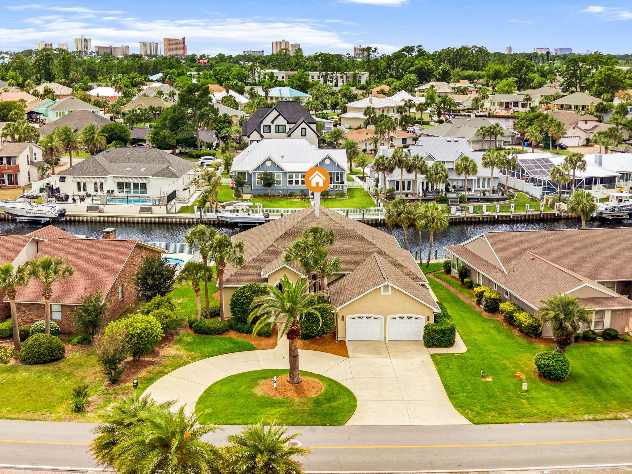 Located within the prestigious gated community of Bay Point, this beautifully updated waterfront residence offers the ultimate coastal lifestyle with 70 feet of deep-water frontage and direct access to St. Andrews Bay, the Gulf, and the Intracoastal Waterway. Designed for both comfort and entertaining, this single-story home combines elegant finishes with exceptional boating amenities. With approximately 7 feet of canal depth, a private dock, and a 10,000-pound boat lift, boating enthusiasts will appreciate the quick and easy access to open water and the short ride to Shell Island. Step outside to your private swimming pool and tranquil waterfront setting, perfect for relaxing after a day on the water or entertaining family and friends. Inside, soaring 12-foot ceilings in the foyer and 10-foot ceilings throughout create a bright and spacious atmosphere. A stunning mahogany entry door welcomes you into the open-concept living, kitchen, and dining areas, complemented by an additional family room for flexible living space. The light-filled living area features a fireplace with custom built-in bookcases, while French doors open seamlessly to the private pool area, blending indoor and outdoor living. The gourmet kitchen is thoughtfully appointed with premium Sub-Zero and Wolf appliances, an induction cooktop, quartz countertops, and breakfast bar seating for four. Travertine and wood flooring run throughout the home, adding warmth and timeless elegance. The spacious primary suite offers a private retreat with dual walk-in closets, dual vanities, a jetted soaking tub, and a large walk-in shower. Additional recent updates include a new water heater in 2025 and a 4-ton HVAC system installed in 2024.

Residents of Bay Point enjoy a secure gated environment with close proximity to Bay Point Golf Club, Bar 72, marinas, dining, and the white sand beaches of Panama City Beach. This is a rare opportunity to own a true boater's paradise in one of the area's most sought-after waterfront communities.