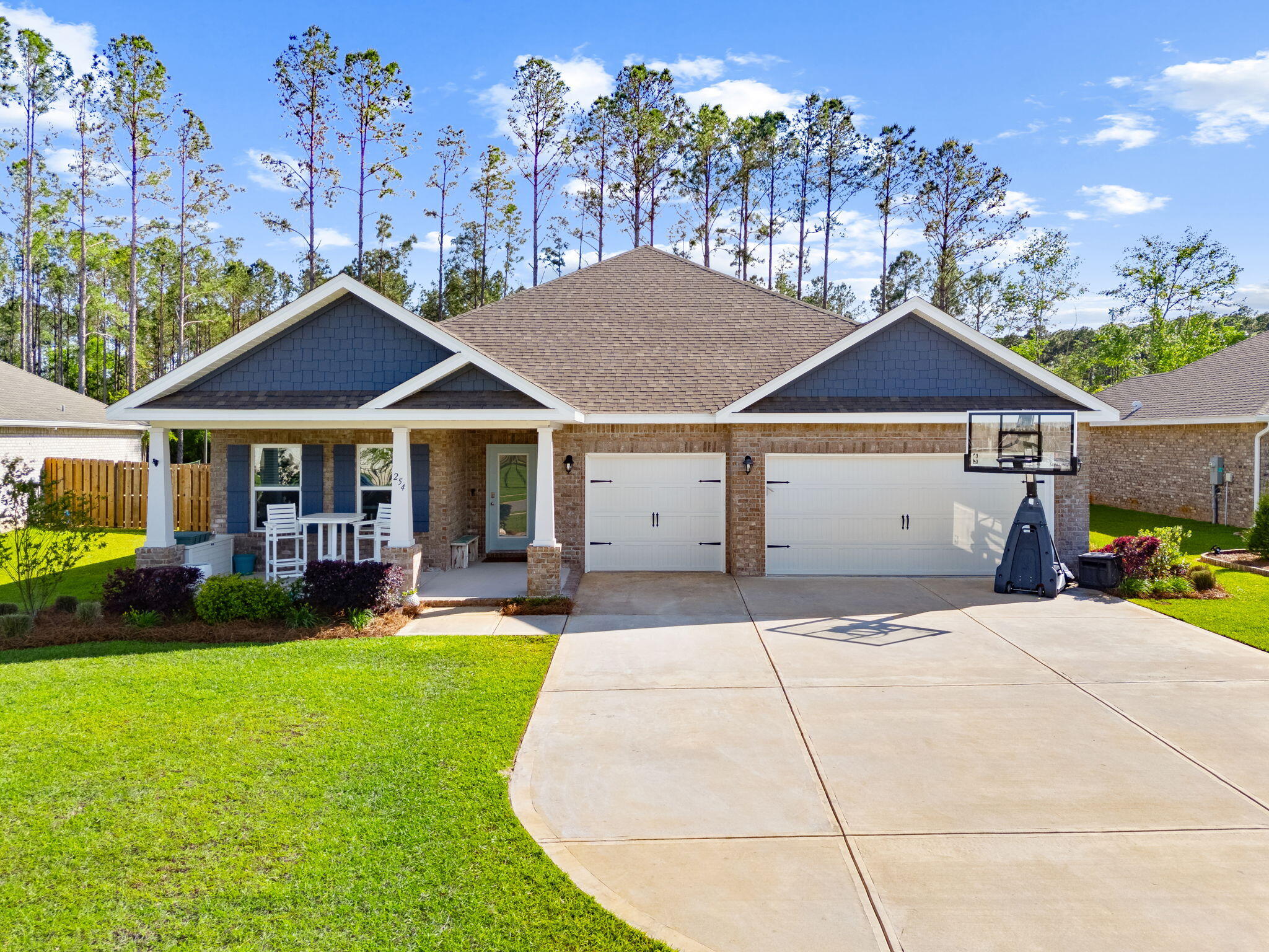 Move right into this beautifully maintained home that offers upgrades, space, and value without the wait of new construction. The open floor plan features durable wood-look tile throughout the main living areas (guest bedrooms excluded), quartz countertops, a custom tile backsplash, stylish pendant and chandelier lighting, and blinds already installed. The fully fenced backyard includes three private gates, providing easy access to the main road and Steamboat Landing on the bay less than half a mile away. There's plenty of room for pets, kids, gardening or entertaining. The heated and cooled 3-car garage is a standout feature with spray foam insulation, a mini-split system, and an epoxy floor --ideal for a home gym, workshop, hobby space, or extra storage. Tucked away in the desirable Hammock Bay South community, this home offers the perfect balance of peace and convenience. Enjoy a quiet neighborhood setting while being just minutes from Hwy 20, shopping, dining, top-rated schools, and the Emerald Coast's beautiful beaches. This move-in-ready home delivers the upgrades today's buyers want without the added cost or wait of new construction. Don't miss your chance to own a home that's truly better than new!