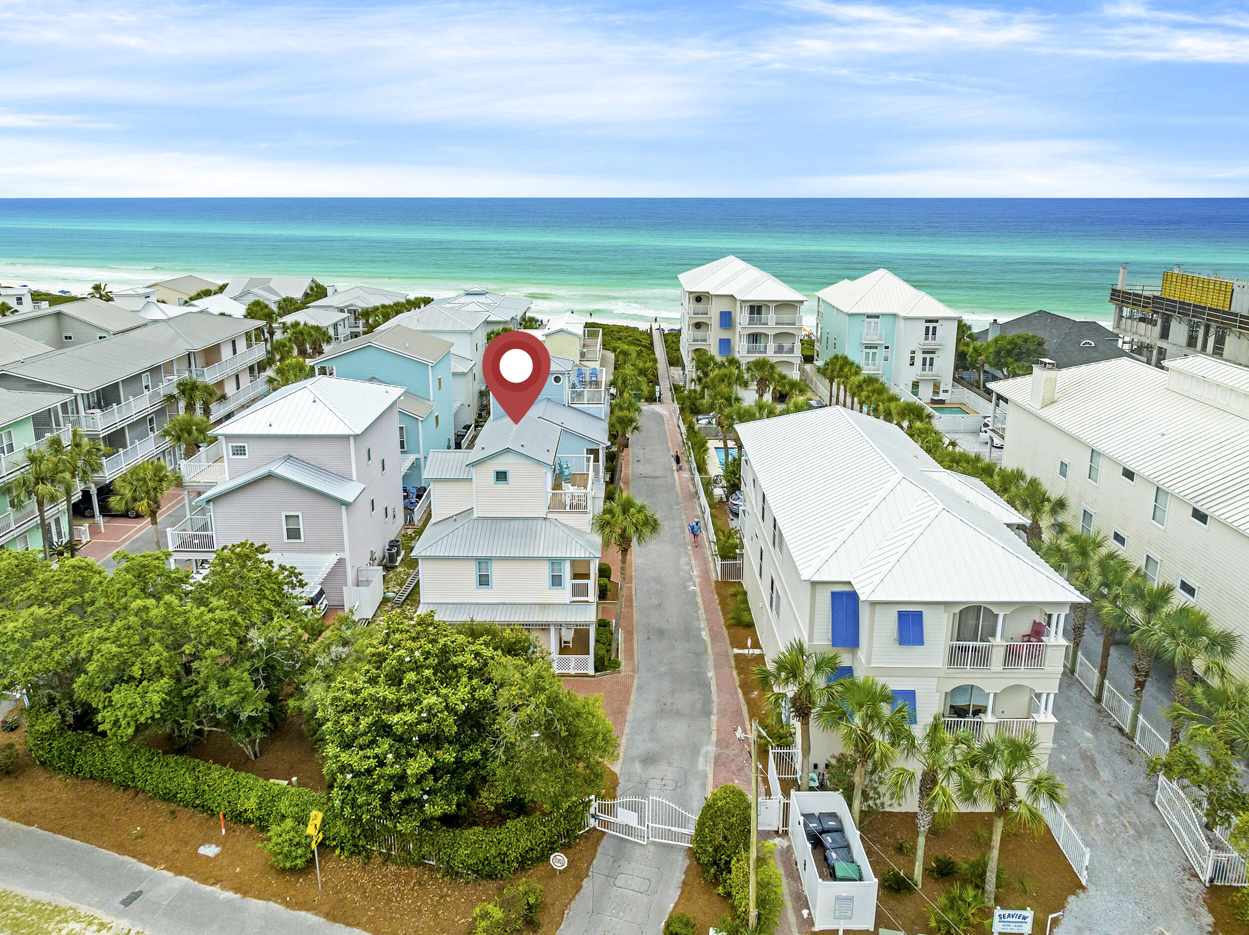 Price DROP - $100K
Enjoy the evening sunsets and gulf breezes from the balconies of Moon Glow, a lovely family-friendly, 3-level home. Only a 150ft to the beach and steps from the community pool. Come and take advantage of all the amenities this great vacation home has to offer.

Enjoy all the comforts of home with large flat-screen TVs in the living room and all the bedrooms, modern appliances in the kitchen, and cozy bedding to relax and unwind after a day of fun in the sun.

The 1st floor features an open-concept entertaining space: the living area with a sleeper sofa and the dining area with seating for 6.  Also on this main floor you'll find the laundry room and a convenient half bath. The 2nd level is where you will find the main bedroom with a king bed and private porch, and another bedroom with 2 full beds and a large walk-in closet. The 3rd floor tower room boasts a comfy queen bed, a wet bar, and another private porch with stunning Gulf views. All bedrooms have attached private bathrooms.

With great dining options just across the street, and fun shopping destinations within walking distance, you'll find this vacation home a most convenient and comfortable vacation getaway.

Sleeping Arrangements:
Bedroom 1: King bed, tv, vanity area, private balcony access, tub and shower area bathroom
Bedroom 2: 2 Twin Full beds, tv, private balcony access, tub and shower area bathroom Bedroom 3: Queen bed, tv, private balcony access, private bathroom
Sofa in the living room pulls out to a queen bed.