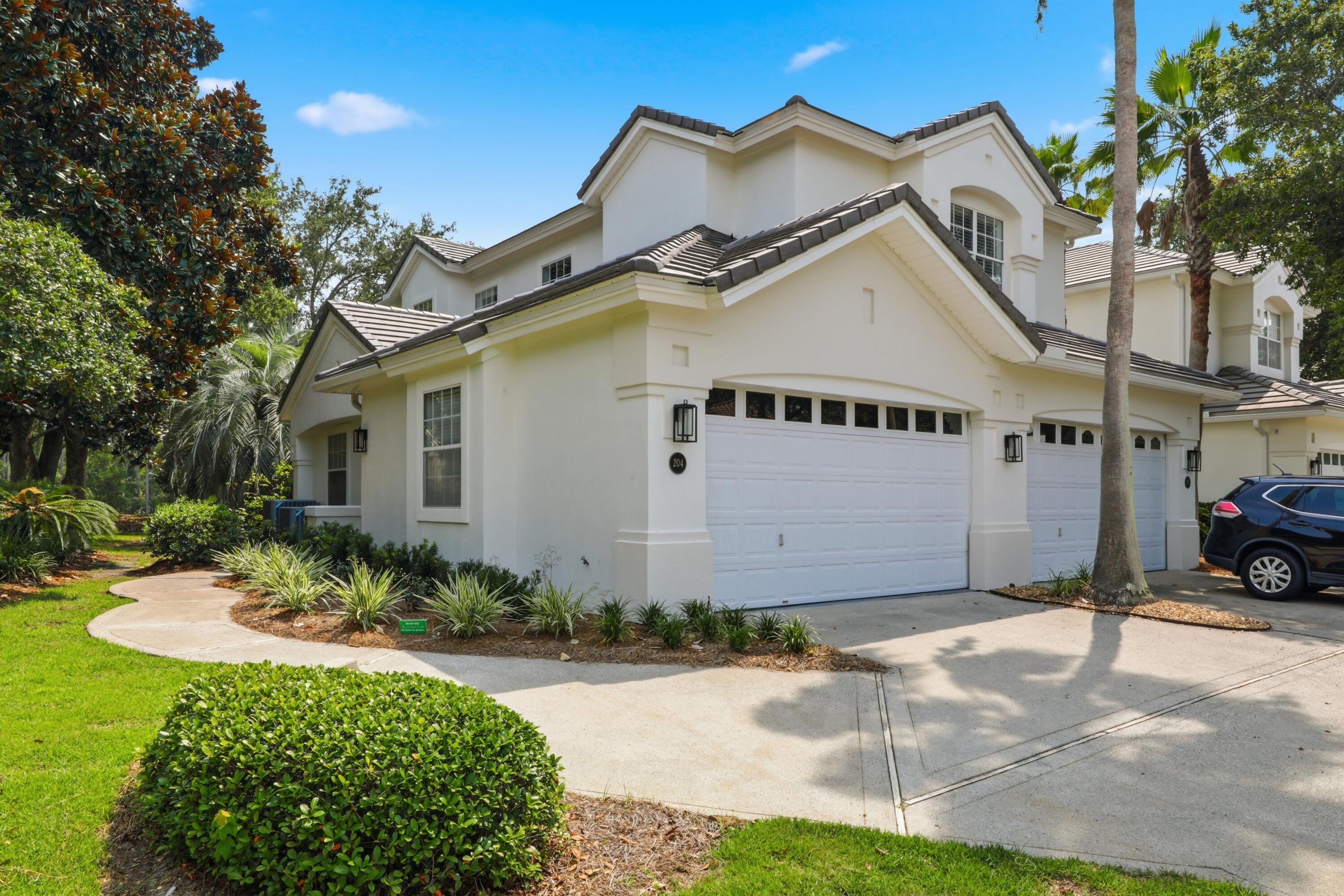 Welcome to one of the most extensively updated Golf Villas in Regatta Bay. This spacious second-floor residence offers 2,545 square feet, 3 bedrooms, 3 full baths, a two-car garage, and an additional dedicated parking space available only to second-floor villas. Built with future elevator capability, this floor plan combines convenience with exceptional livability.

Inside, nearly every major component has been thoughtfully upgraded. The chef's kitchen features custom cabinetry, quartz countertops, Bosch appliances, a beverage refrigerator, and a separate wine refrigerator. The primary bath has been completely reimagined with a freestanding soaking tub, oversized shower, custom vanities, and designer finishes. A cozy sitting area with an electric fireplace extends the kitchen, while the living room features a custom built-in entertainment wall with surround sound and LED accent lighting.

Recent updates include a 2023 HVAC, 2024 tankless water heater, new balcony screens and framing, a 2024 tile roof, 2026 exterior repainting, updated lighting, and refreshed landscaping.

Over 350 square feet larger than downstairs villas, this upper-level floor plan offers generous living space. Located within gated Regatta Bay, residents enjoy championship golf, tennis, pickleball, walking trails, pools, playgrounds, and are minutes from the beach, shopping, dining, and entertainment.