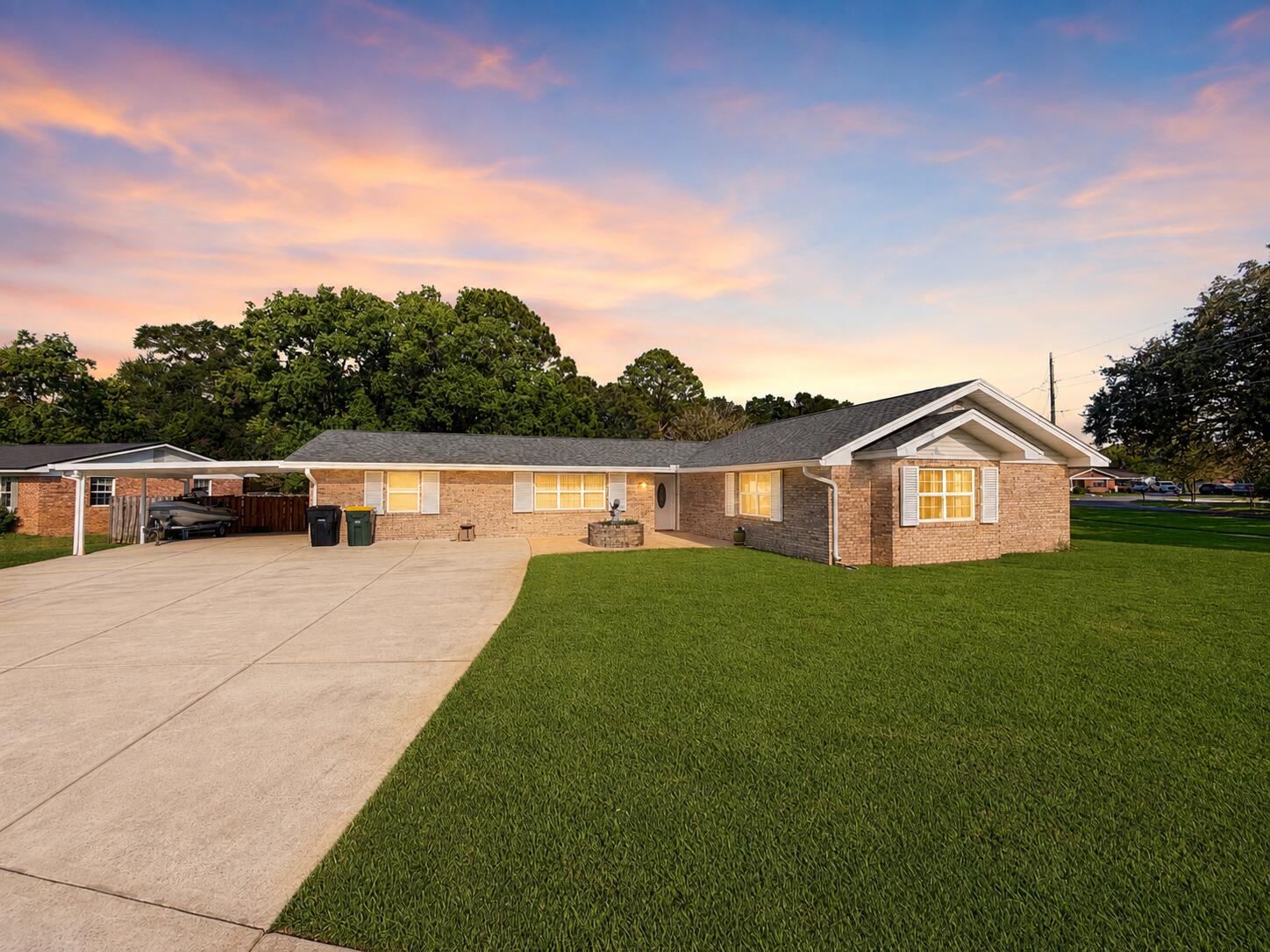 Welcome to 133 Walton Drive NE, a spacious and exceptionally well-maintained all-brick residence situated on a beautiful corner lot in Fort Walton Beach. Built in 2005 and offering approximately 2,406 square feet of heated and cooled living space, this single-story home combines substantial construction, generous room sizes, and an impressive collection of major system improvements designed to provide comfort, reliability, and peace of mind.

Inside, the home is bright, clean, and highly functional, with an open connection between the kitchen, dining, and primary living areas. The kitchen offers extensive natural-wood cabinetry, abundant countertop and storage space, a gas cooktop, built-in wall oven, stainless-steel appliances, and a wide pass-through overlooking the adjoining living area. A separate dining space provides plenty of room for everyday meals or larger gatherings and features convenient access to the outdoor patio through sliding glass doors.

Multiple living and flex spaces give the home valuable versatility. In addition to the spacious main living room, the floor plan provides room for a home office, media area, guest accommodations, hobby space, or additional sitting areas. The bedrooms are notably generous, offering excellent natural light and ample room for substantial furniture. The primary suite provides an especially spacious retreat, while the bathrooms include tiled surrounds, generous vanity storage, a soaking tub, and a separate walk-in shower. A dedicated laundry room with upper cabinetry adds additional convenience and storage.

The exterior presents beautifully with full-brick construction, mature landscaping, and maintained St. Augustine grass supported by a fully operational irrigation system. The expansive driveway and side carport provide abundant parking and flexibility for vehicles, recreational equipment, or covered storage. Its prominent corner-lot placement gives the property an attractive street presence and a more open, spacious setting.

Major improvements and infrastructure are among the home's strongest advantages. Per the seller, the property features a 2025 five-ton HVAC system with both interior and exterior units replaced, a 2022 water heater, a 2022 dimensional-shingle roof with a 30-year rating, and a whole-home generator installed in 2015. Additional features include storm shutters, copper wiring, PVC plumbing through the main and home lines, and a yearly termite bond. Together, these improvements address many of the major ownership concerns commonly associated with older homes in the surrounding area.

133 Walton Drive NE offers a compelling combination of size, durability, thoughtful maintenance, and practical living space. With its strong mechanical systems, flexible floor plan, spacious rooms, attractive grounds, and desirable corner-lot setting, this property is well suited for buyers seeking a dependable home with plenty of room to live, work, entertain, and grow.

All information, measurements, dates, system specifications, improvements, and property details are believed to be accurate but are not guaranteed. Buyer and buyer's agent should independently verify all information deemed important.