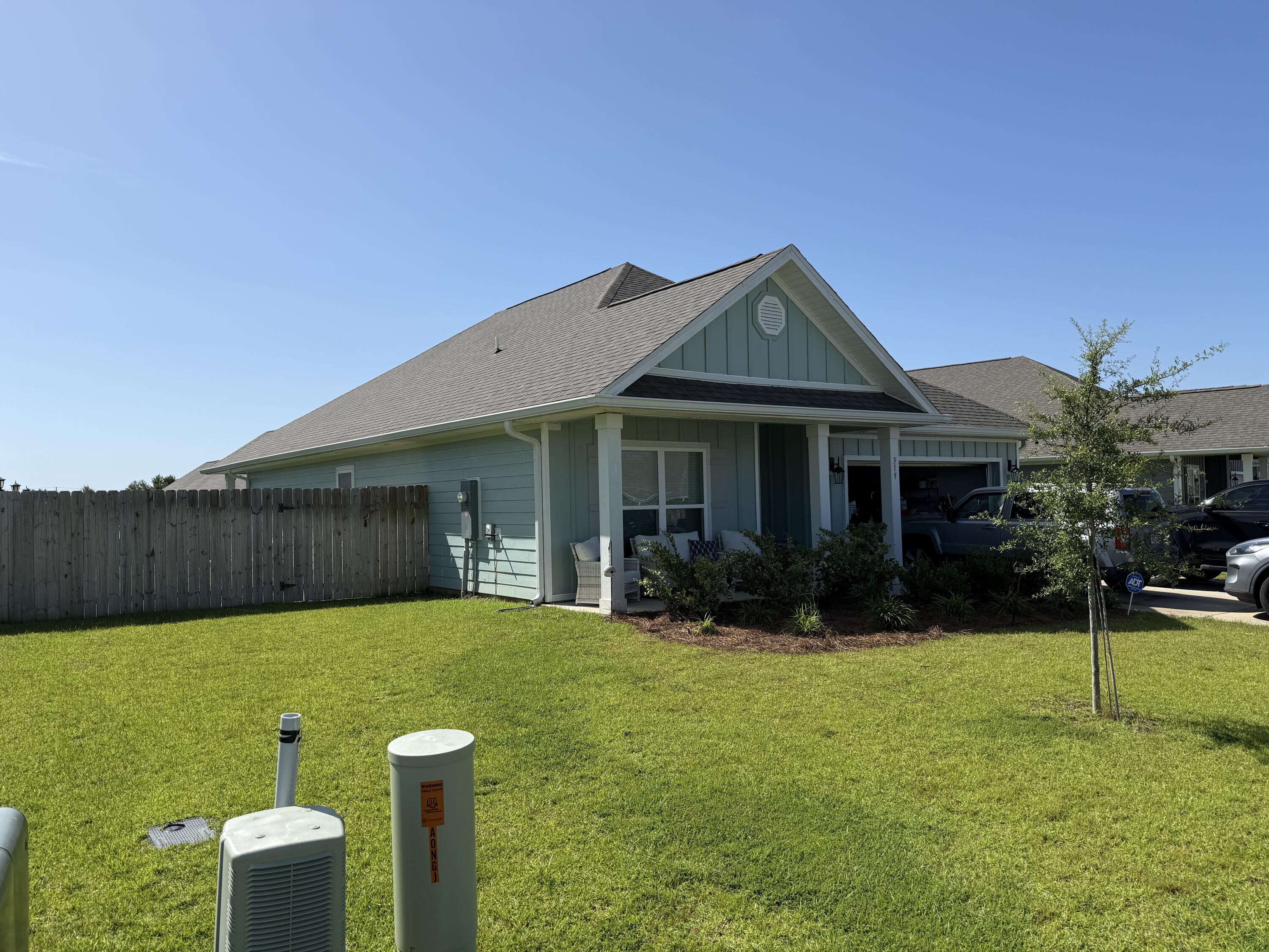 Nestled off of Highway 331 in Freeport, you'll find the Rhett floorplan, a lovely one-story, four-bedroom, two-bathroom home that boasts over 1,800 square feet of cozy living space! All three guest bedrooms are conveniently located in the front of the home. The kitchen, located towards the center, showcases beautiful white cabinets and stunning granite countertops, complete with a large center island that flows seamlessly into the dining area and living room. The primary bedroom, your private retreat, is separated from the guest bedrooms for added privacy. You'll love the primary bathroom, which features a refreshing standing shower and a relaxing full soaker tub, along with double vanity sinks and a spacious walk-in closet!