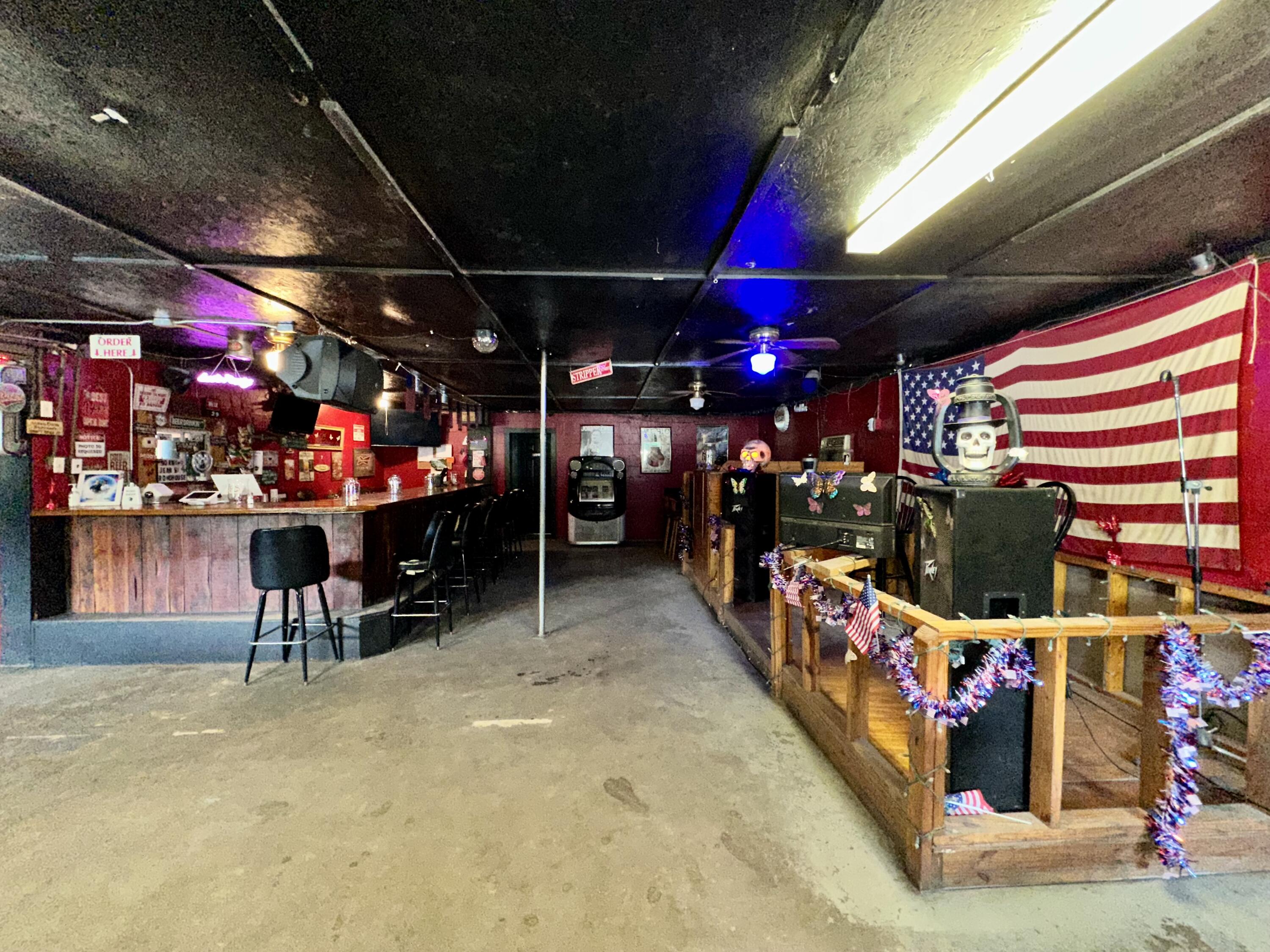 Live, Laugh, Lounge. Your Business Dream Starts Here with +/- 90ft of US Hwy 90 frontage! Ready to pour up profits and crank up the fun? This 2,103 sq ft commercial gem on .37 acre is more than a building, it's a full blown good time headquarters, waiting for its next owner to make a splash in the nightlife or entertainment scene. Step inside to find a spacious L-shaped bar outfitted with triple and double coolers, and plenty of elbow room for slinging drinks and making friends. There's even a serving window to the 28' x 24' patio, perfect for outdoor vibes and sunset sips. Got talent? Showcase it! With a karaoke stage, live music stage, and DJ booth, this place is set for entertainment. Add in the pool tables, tables and stools, and you've got all the ingredients for a crowd-pleaser. Two bathrooms, a dedicated storage room/office, and a 12 X 24 storage shed. The best part? It's turnkey, just unlock the doors, set up your equipment & your playlist, and watch your business come to life.Cheers to your next adventure. The stage (and keys) are waiting!
And if bar life isn't your thing, don't worry, this versatile space offers plenty of other commercial opportunities. Let your imagination run wild!