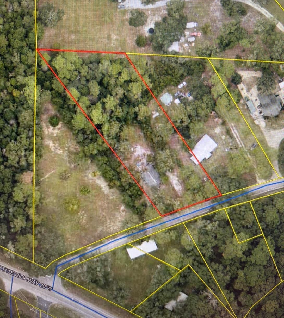 Everything ready for a new development.  Land use shows High Density Residential.  THis property has an older home currently used as a rental.  This property has amazing potential and located a short walk to the City Pool and playground area. City Water and Sewer are available on this paved street.  Beautiful natural landscaping on this larger parcel totaling over 1.16 acres.  Level with no wetlands, this parcel has large Live Oaks and Magnolia trees.   Perfect for a new home with lots of room or great for High density development.  Located in the City Limits of Freeport, this could be a great find!!!!