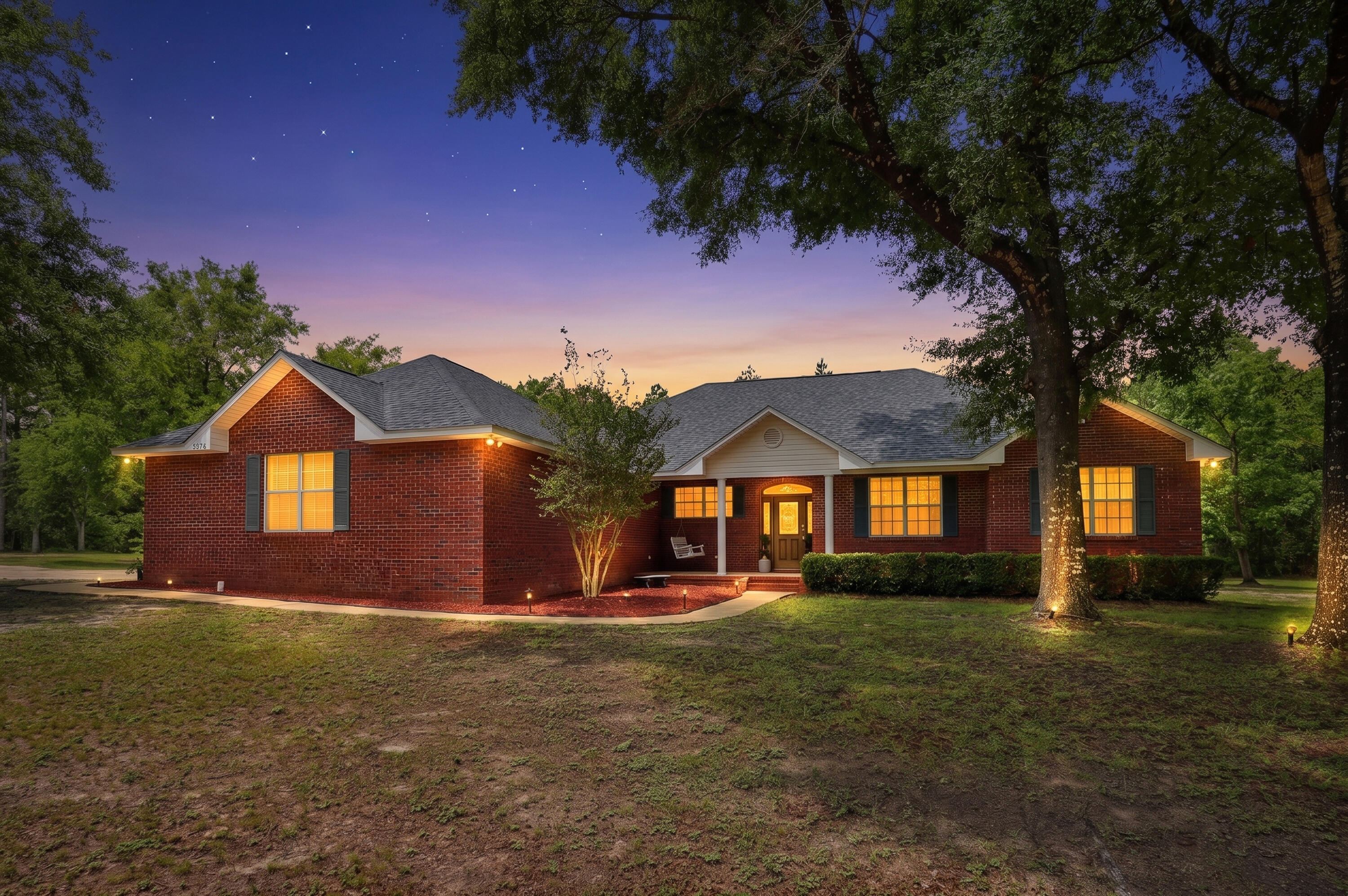 Welcome to your private country retreat! This beautiful 4-bedroom, 2.5-bath home offers 2,096 square feet of comfortable living space on a full acre, conveniently located near schools, shopping, and everyday amenities. Designed for both entertaining and everyday living, the open floor plan features a spacious kitchen with an island, pantry, and all kitchen appliances included. Large laundry room right off from the kitchen includes sink, folding area and plenty of cabinets for storage. The inviting primary suite boasts a tray ceiling with accent lighting, a large walk-in closet, and a spacious en-suite bath complete with a garden tub and separate shower. Two of the additional bedrooms are connected by a convenient Jack-and-Jill bathroom, each offering its own vanity and closet area. Step outside to your backyard oasis featuring a gorgeous in-ground pool, covered patio, and plenty of space for gatherings with family and friends. Major updates provide peace of mind, including a new roof (2023), HVAC system (2024), drain field lines (2025), hot water heater (2026), and pool liner (2026). Additional features include a security system and sprinkler system (conveys As Is). Seller is offering a 1 year home warranty from Fidelity National Home Warranty valued at $500.  Don't miss this rare opportunity to enjoy country living with modern conveniences and exceptional outdoor amenities. Schedule your showing today!