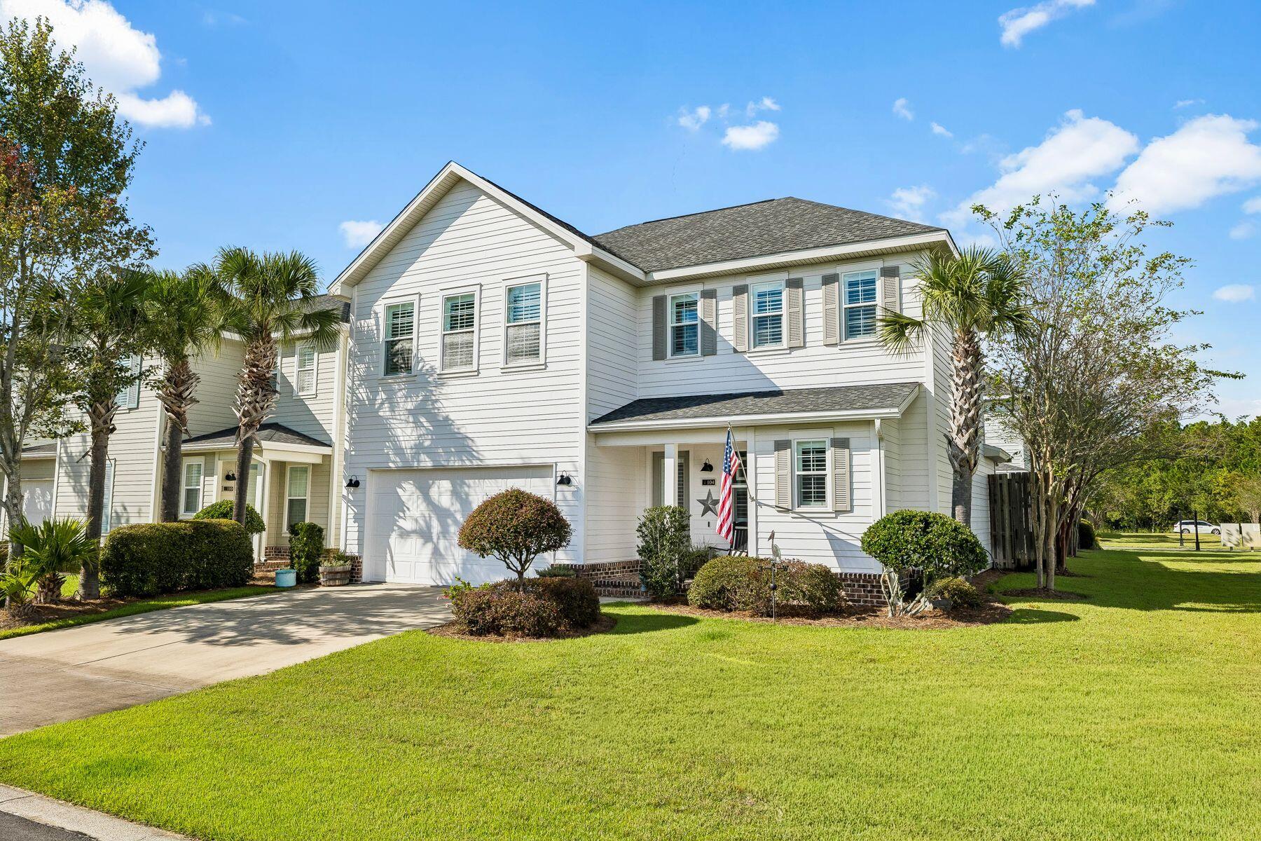 Perfectly positioned on a desirable end lot overlooking a peaceful green space, this home offers added privacy and openness without the upkeep of a large yard. Within Church Street Village, the community pool, fitness center, and playground are just steps away, making it easy to enjoy the neighborhood close to home.

The private patio extends the living space outdoors, with room for grilling, morning coffee, or dining al fresco. A newly installed traffic light at the intersection of S Church Street and Highway 98 makes the connection to the Gulf even easier, with a convenient route for a bike or golf cart ride to the beach.

Inside, the home has a comfortable, open-concept feel with shiplap accents, quartz countertops, quality appliances, and plenty of space to gather or unwind. The main level includes a spacious great room, well-appointed kitchen with pantry, guest suite, powder room, and generously sized laundry room with additional storage. Upstairs, the primary suite provides a private retreat with an en suite bath and walk-in closet, while two additional bedrooms share a Jack-and-Jill bath.

An oversized two-car garage provides plenty of room for bikes, beach gear, and additional storage. With lawn care and exterior maintenance included, there's more time to enjoy the pool, take the bikes to the beach, or simply settle into the easy pace of coastal living.