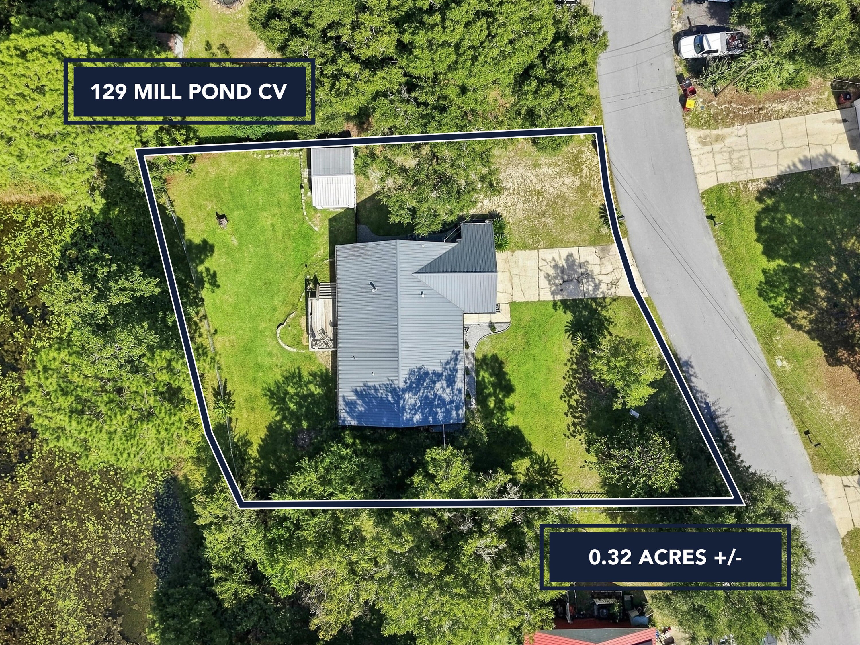 Enjoy Southern living in this 5 bedroom beauty on a pond, bonus because it's south of I-10. The living area is bathed in light from the tall windows overlooking your tranquil view. The back deck is SOLID, perfect for quiet mornings or evenings with your favorite beverage. The floorplan uses every square foot, upstairs and down. The primary bath has just been updated, and the home features 2 more FULL bathrooms. It's near the end of a cul-de-sac, situated on just over a third of an acre, and has a fairly level driveway. This gem actually has a white picket fence and the whole home is designed for comfort and efficiency. At 1988 square feet and an outdoor area to explore, everyone will have space to breathe! Metal roof is 5 years old, HVAC is 13, tankless WH is 9, septic pumped this year.