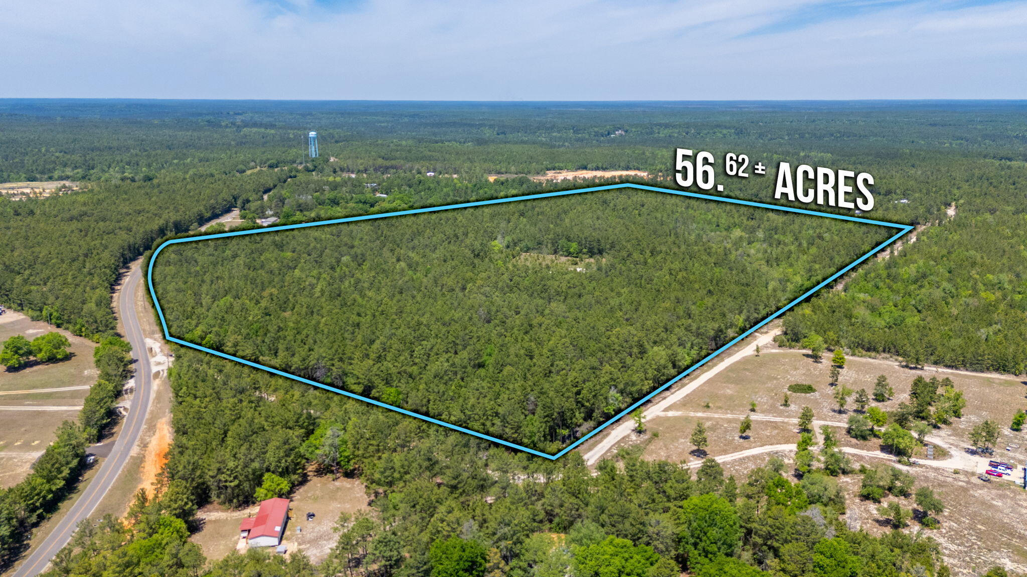 56.62 ACRES with 615+/- feet of paved road frontage in North Walton County! This versatile property offers a rare combination of privacy, accessibility, and potential--making it ideal for a future homesite, recreational retreat, or investment opportunity.

Power is available along the road and public water is already on site (just needs to be reactivated by the new owner), helping simplify the path to building. The property is rich with natural beauty and wildlife, creating the perfect setting for those looking to enjoy the outdoors, hunt, or simply escape the pace of town.

A unique bonus for outdoor enthusiasts--two skeet shooting towers are already in place, making this a ready-to-use setup for shotgun sports or entertaining guests.

Located just north of the Mossy Head area, this provides a convenient drive to the Emerald Coast beaches, shopping centers, and surrounding towns while still offering the peace and space of country living.

Whether you're looking to build, invest, or create your own private getaway, this property checks all the boxes.