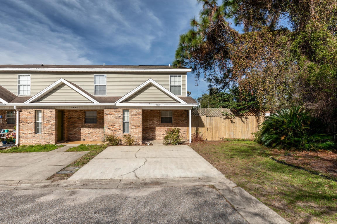 Great end unit townhouse in Ocean City area of Fort Walton Beach.  Two bedrooms, one and a half baths in this  1250 sq ft beauty with a fully fenced rear and side yard, not to mention a two car driveway for the vehicles.  Spacious kitchen looks right into the Dining and Living rooms with a conveniently located half bath.  Upstairs you'll find two spacious bedrooms and a full bathroom as well.