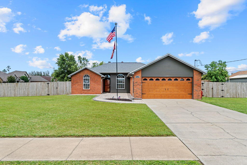 Welcome to 5505 Merritt Brown Rd, where a comfortable 3-bedroom, 2-bath home meets a spacious 0.32-acre corner lot in Panama City. With no HOA and located in Flood Zone X, this property offers a combination of space, flexibility, and everyday functionality that's worth a closer look.

Inside, you'll find a welcoming layout with a spacious living room, functional kitchen, central air, and an electric fireplace that adds warmth and character to the living area. The brick exterior adds timeless appeal, while the two-car garage provides convenient everyday functionality.

Step outside, and that's where this property really starts to shine. The 0.32-acre corner lot gives you plenty of room to enjoy the outdoors and create the space you've been envisioning. Whether you imagine a beautiful outdoor retreat, a place to entertain, room for gardening, or simply having more breathing room around your home, there's plenty of space to bring your ideas to life. The enclosed patio and storage shed add even more versatility to the property.

This is the kind of home that gives you a solid foundation today while leaving plenty of room for your own personal touch tomorrow.

If you've been looking for a property with a great lot, no HOA, and the space to make it your own, come take a look at 5505 Merritt Brown Rd. You may find exactly what you've been looking for.