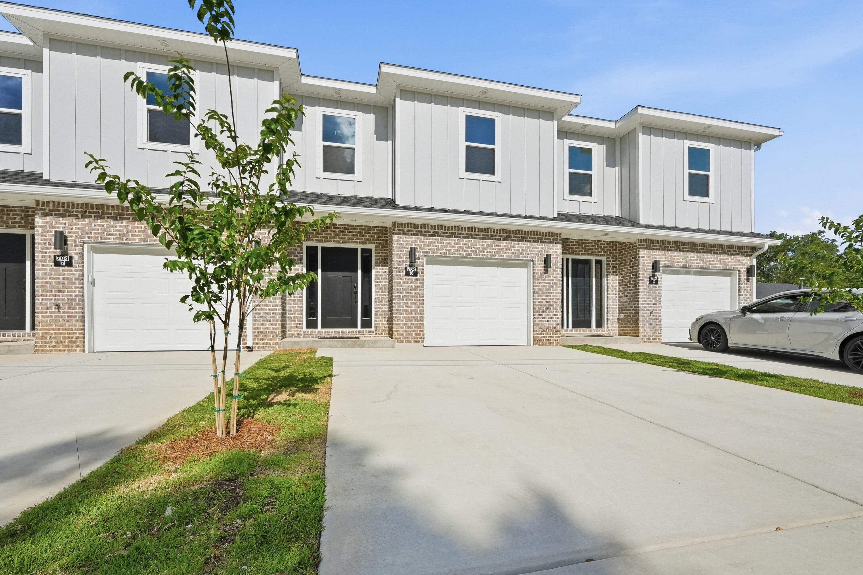 New Construction! INTERIOR UNIT. 4 interior packages! $10K in ANYWAY MONEY! 2-10 Builder Warranty, Termite Bond. Luxury Vinyl Plank throughout. Upstairs enjoys 4 bedrooms, 1 full guest bath, 1 on-suite bath for primary, & laundry room. Downstairs foyer leads to ½ bath, kitchen w/ breakfast peninsula & Stainless Appliances to include side by side refrigerator, Self-Cleaning Convection Stove, built-in microwave/range hood & dishwasher. Kitchen has quartz counters & tiled backsplash for modern vibes. Kitchen opens to the living & dining room. Elevated lighting & mirrors finish off the home. Back door leads to privately fenced backyard with a gate which opens to a water retention area brilliantly used as an unofficial dog park for owners. Apoxy Sealed Garage Flooring for a final touch