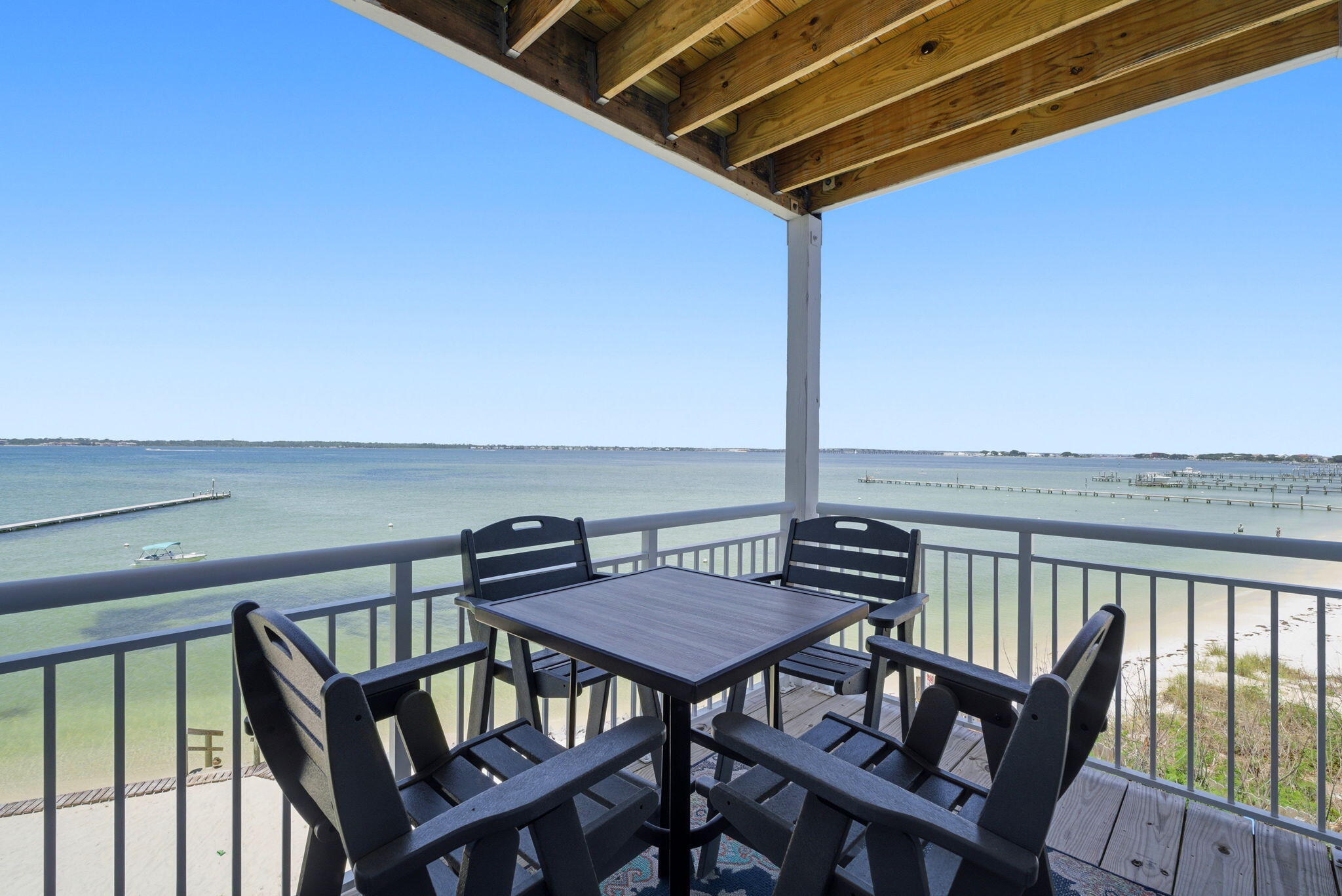 Experience waterfront living at its finest in this beautifully updated 2-bedroom, 2-bath corner unit at Baywatch Condos on Pensacola Beach. Sold fully furnished and completely turn-key, this income-producing condo is ready to start generating revenue from day one.

This desirable corner unit offers abundant natural light, stunning water views, and an inviting coastal atmosphere perfect for both personal enjoyment and vacation rental guests. The property generated an impressive $39,407 in rental income in 2025, making it an exceptional investment opportunity.

Recent 2025 upgrades include fresh interior paint, new washer and dryer, new dishwasher, new water heater, and a new HVAC system -- providing peace of mind and modern convenience for years to come.

Whether you're looking for a vacation getaway, second home, or proven short-term rental investment, this waterfront condo checks every box. Enjoy easy access to the beach, boating, dining, and all that Pensacola Beach has to offer.