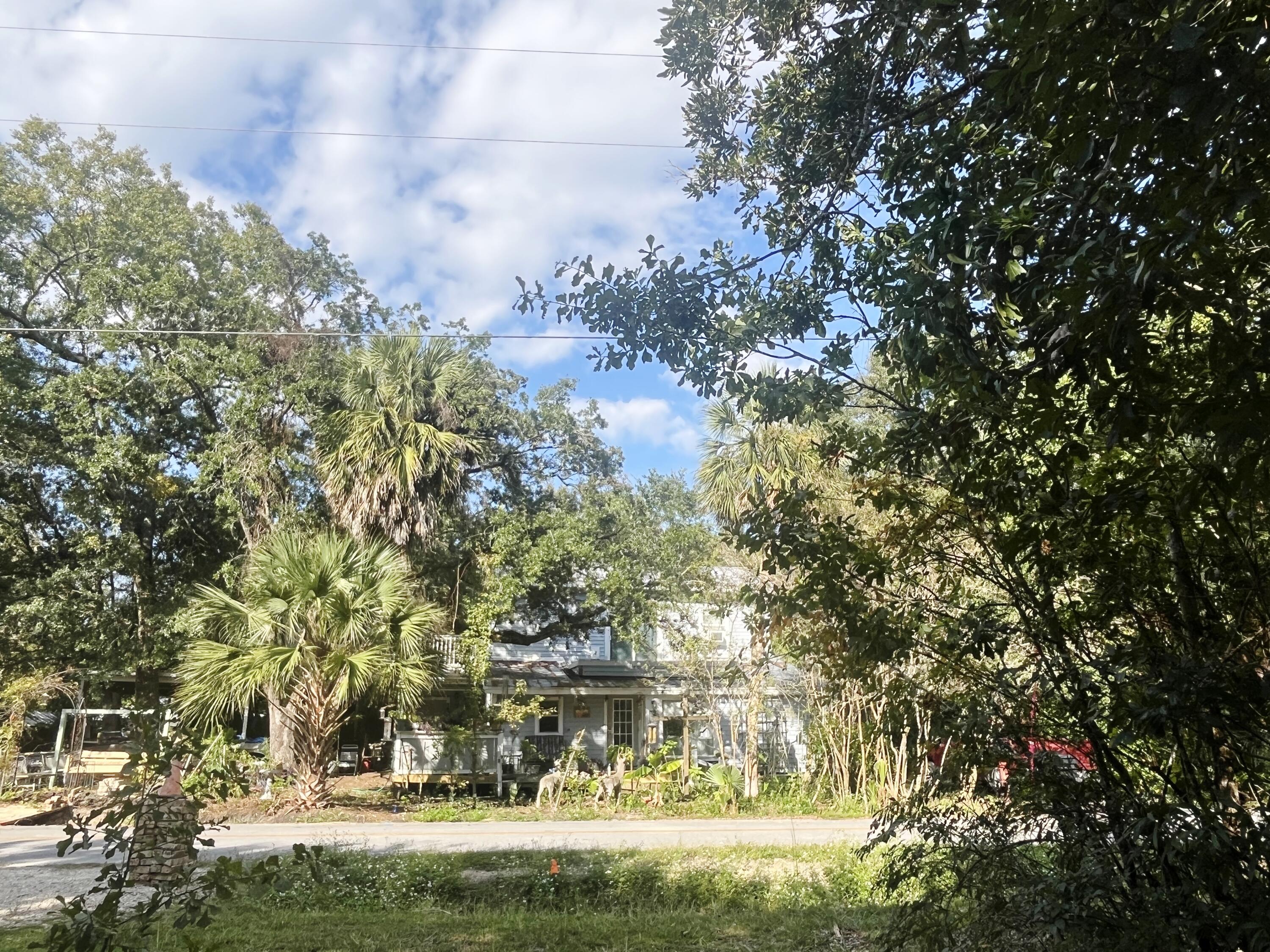 This is a GREAT opportunity to buy a detached, single-family home on 3 level, interior building lots in this fast-growing area within walking distance to Grady Brown waterfront Park with boat launch! No HOA either! Convenient to 331 bridge and the world's most beautiful beaches of South Walton and the ever-growing communities of Freeport.  Build your dream home and have room to spread out or build 3 individual new homes. Great for builders or investors. The possibilities are endless here. The home has 2,336 sq ft downstairs and a 784 sq ft addition upstairs, totaling 3,120 sq ft. The home conveys ''As Is''. Mobile home adjacent to 58 Hankins Rd. is not part of this sale and will be removed prior to closing. Additional land available across the street. See MLS 998102.