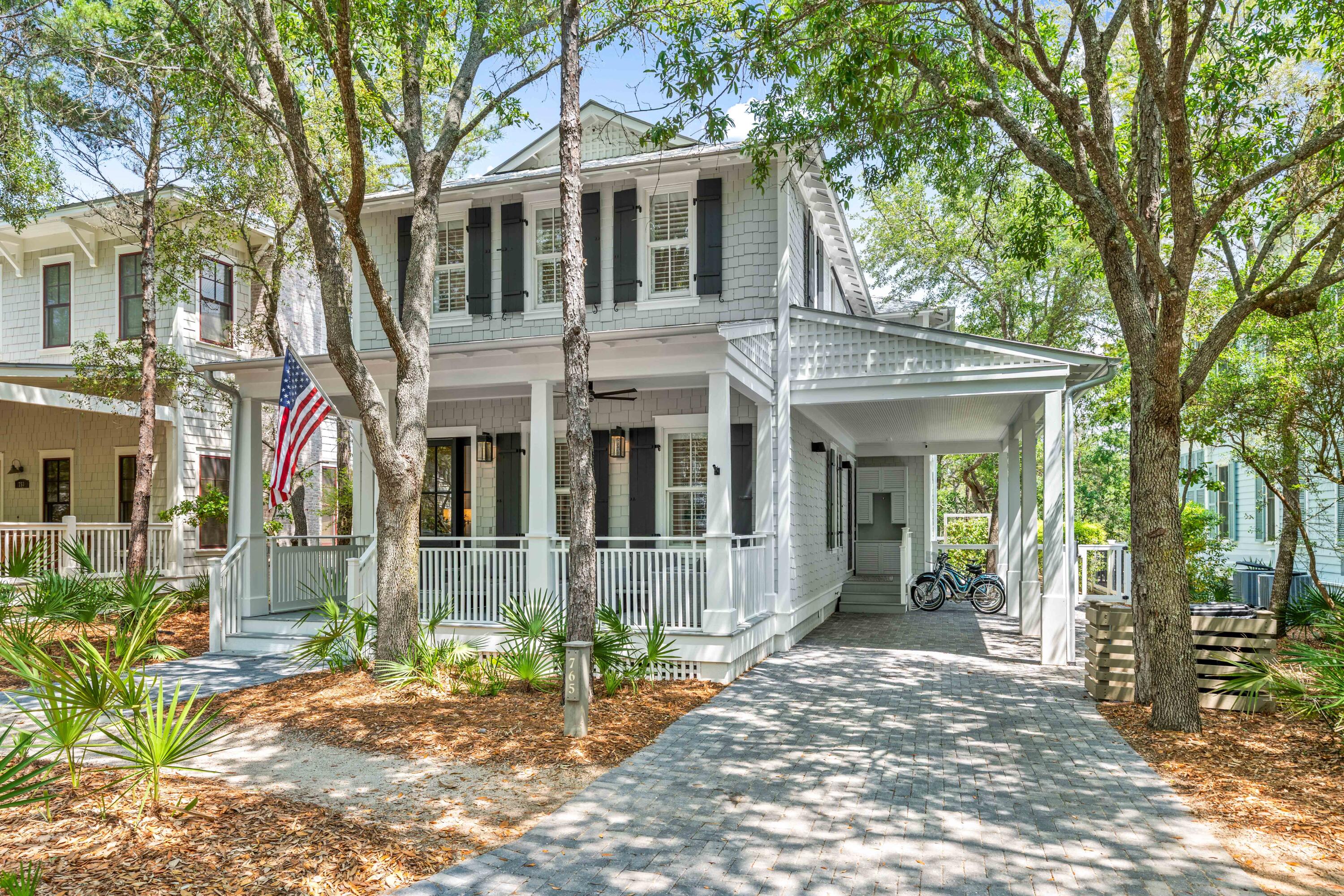 Welcome to this beautifully renovated WaterColor home in the coveted Phase I, perfectly positioned on the north side of Western Lake Drive with a rare private backyard.

One of few WaterColor homes in Phase I to have a pool/spa and private backyard.  The main living area is open and inviting, with coffered ceilings and marble countertops in both the kitchen and baths. Natural light fills the space, and the living and dining areas look out to a peaceful, private setting with a subtle glimpse of Western Lake.