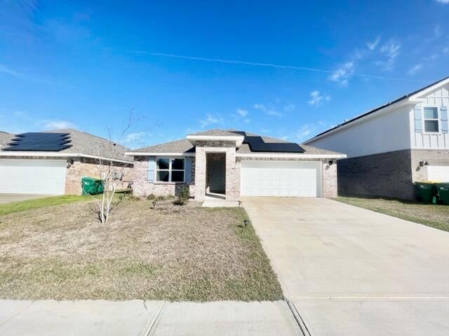**Available November 9th!!!**

This stunning 4 bedrooms, 2 baths home features a covered back patio & 2 car garage. The kitchen has a nice island bar, stainless appliances, smooth top range, built-in microwave, dishwasher & awesome open design perfect for entertaining. wood look flooring throughout with carpet in the bedrooms. Bedroom 1 & the adjoining bath features a walk in closet, double vanity sinks and large 5' shower. All brick exterior makes for a very stylish home in the new Patriot Ridge HOA community with sidewalks, and a beautiful community pool for residents enjoyment!
