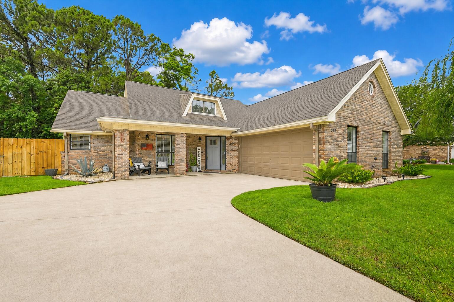 PRICE REDUCTION! Major updates already completed, including a 2023 HVAC, 2020 water heater, and 2017 roof. This is one of those homes you truly have to experience in person to appreciate--the natural light, spacious layout, and meticulous condition create a feeling that photos simply can't capture.

Located in desirable Overbrook with NO HOA, this brick home sits on approximately 0.23 acres and offers a large fenced backyard with no rear neighbors, a wide gate for RV or boat storage, lush green grass, and extended driveway parking.

Inside, vaulted ceilings and an open staircase create an airy feel, while the living room features tile flooring, a natural stone fireplace, and access to the enclosed Florida room overlooking the backyard. The kitchen includes granite countertops, updated fixtures, and a pass-through opening that connects the living and dining areas while maintaining defined spaces.

The first-floor primary suite and half bath provide convenience, and every bedroom includes a walk-in closet. Additional features include a dedicated laundry room with built-in wall niche storage, a smart security system on doors and windows, underground utilities, sidewalks throughout the neighborhood, a two-car garage, and plenty of storage.

Conveniently located between Eglin AFB and Hurlburt Field with easy access to local beaches, shopping, dining, and recreation.