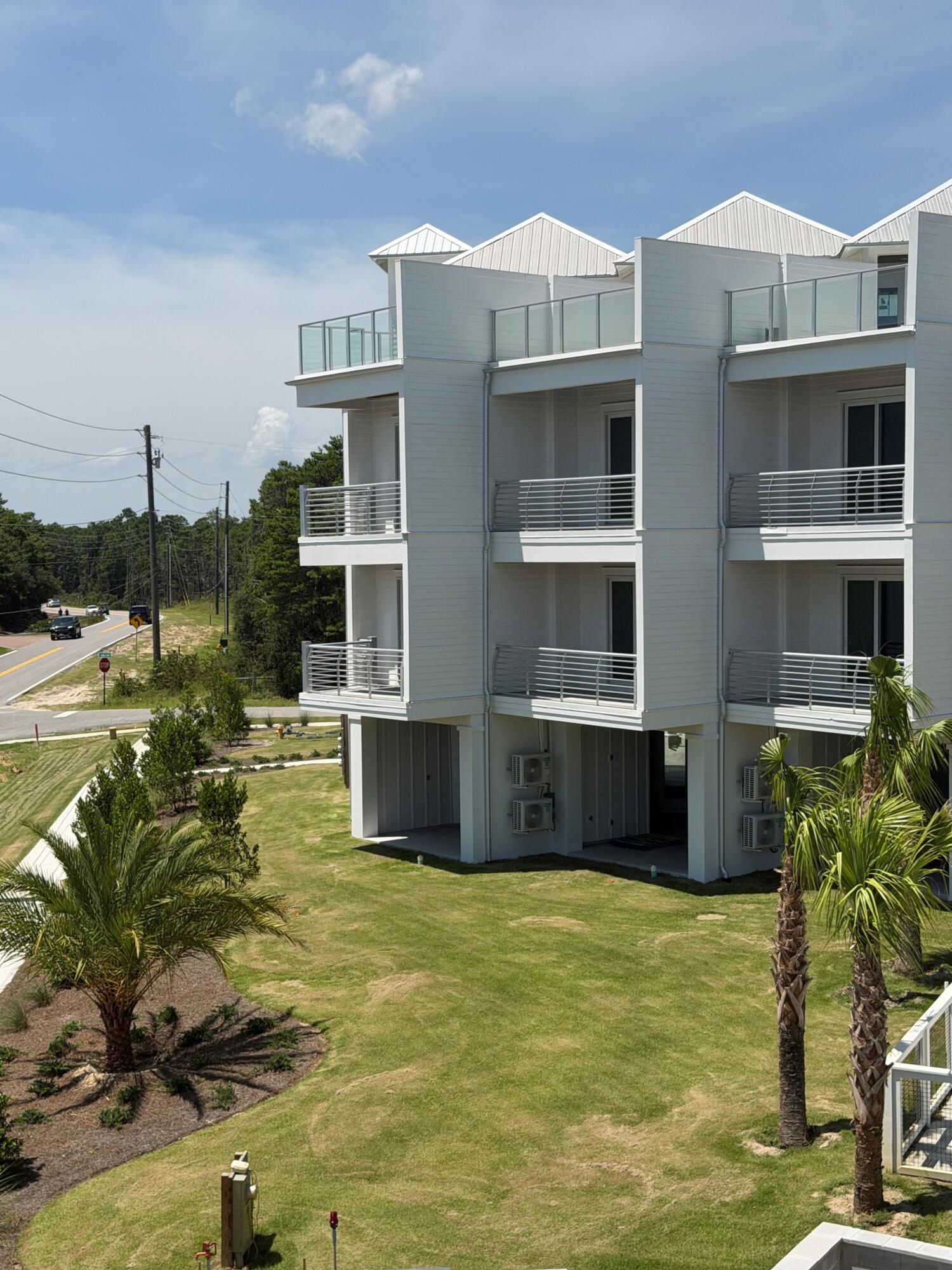 A beautiful townhome enclave with direct coastal dune lake access and gulf views.
Camp Creek Town homes will feature 5 lake front and 7 back townhomes all with exceptional views directly on 30A.  Experience a unique roof top partially covered outdoor living area to enjoy views. Public beach access is a short distance away as well as direct access to Camp Creek Lake. A beautiful walkway leads down to the community dock for outdoor activities including paddle boarding and swimming. Featuring 10' ceilings, solid wood floors, shiplap, quartzite countertops, Cafe appliances, a heated community club pool in the heart of it all.  Construction completion date projected August 2026. Room dimensions are approximate.