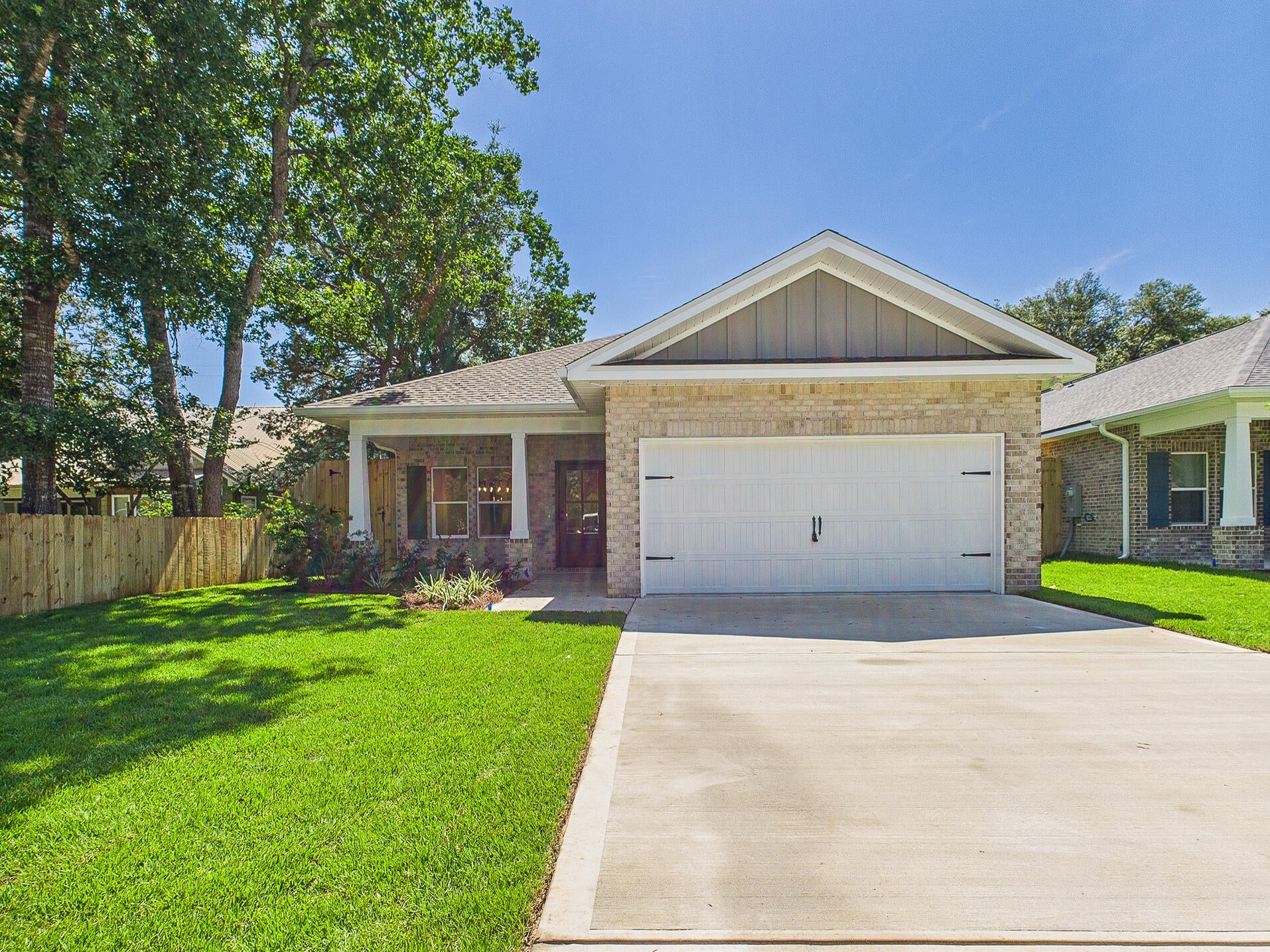 MOVE - IN READY!! The builder is covering 2% of the buyer's closing costs, plus doc stamps, title fees, and the final survey. A fence and refrigerator are also included, and buyers can choose from multiple blind options to customize their new home. Welcome to 1575 Pine Street, a beautifully crafted new construction home in Niceville, Florida. Designed for both comfort and style, this 4-bedroom, 2.5-bathroom home offers 2,123 sq. ft. of well-planned living space. The kitchen is a standout, featuring Quartz countertops, a ceramic tile backsplash, double-edge shaker cabinetry, and sleek stainless steel appliances. Throughout the home, LVP flooring provides both durability and elegance, while matte black hardware and modern finishes enhance the design. Energy efficiency is key, with natural gas fueling the heat, cooking range, dryer hookup, and tankless water heater, keeping utility costs lower. Don't miss out on this fantastic opportunity! Photos are of a different floor plan with similar finishes. Some details depicted may not be the same. *Fence, Blinds and fridge included with acceptable offer and must be included in additional terms. Builder incentives must be written into the contract and are only available with acceptable offer.*