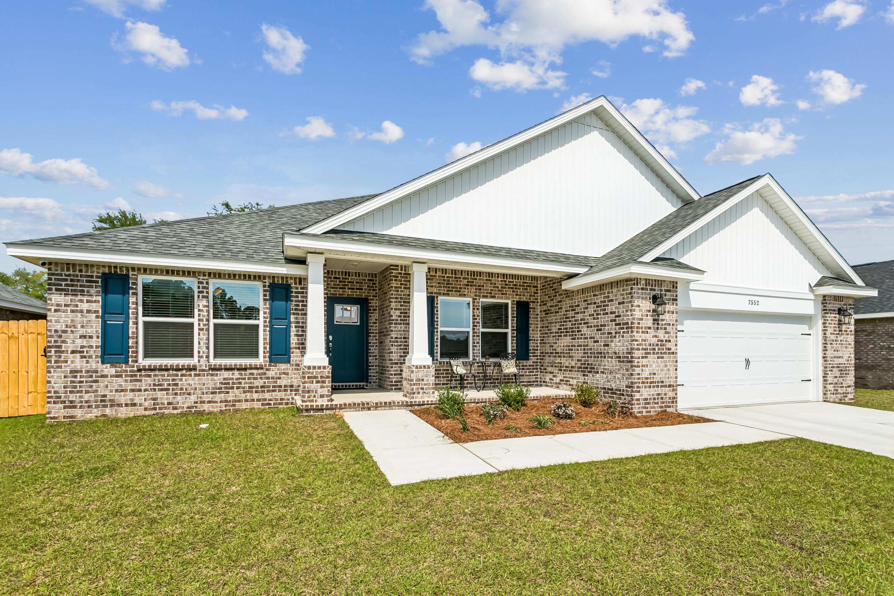 The Turquoise is a beautifully designed 5-bedroom, 3-bath brick home offering a spacious open-concept layout ideal for both everyday living and entertaining. The kitchen includes stainless steel appliances, granite or quartz countertops, under-cabinet lighting, and generous cabinet space, all opening into the great room.
Elegant crown molding enhances the main living areas, and a whole-house 2'' faux wood blind package is included throughout for added privacy and convenience. The luxurious primary suite features tray ceilings, dual walk-in closets, a garden tub, and a tiled walk-in shower with dual showerheads. A private guest suite with its own full bath provides added comfort for family and visitors.
Buckeyes Landing is ideally situated in the heart of Holley-Navarre. The neighborhood is located off Bob Tolbert Road, providing convenient access to major routes including US-98 and State Road 87 for easy commuting east toward Destin or west toward Pensacola. Just minutes from local amenities - including shopping, restaurants, parks, highly rated schools, and world class beaches. Photos and 3D Tour are of a similar completed home and are for illustrative purposes only. Actual home, colors, finishes, fixtures, options, and features may vary
Projected completion is November 2026.