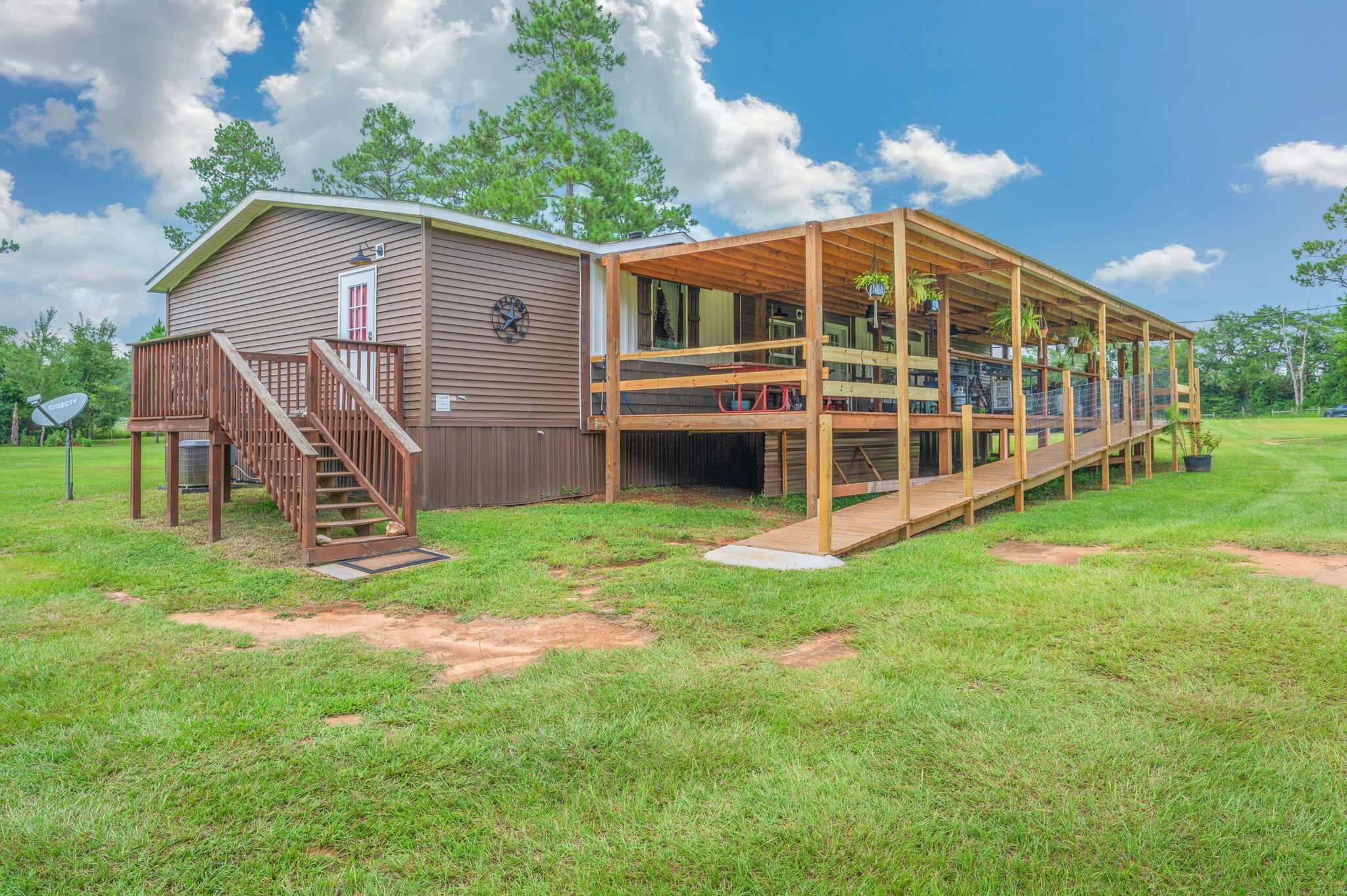 Escape to the peace and privacy of country living with this beautiful 20± acre property featuring a 2020 manufactured home surrounded by open space and natural beauty. Whether you're looking for a homestead, hobby farm, or simply room to spread out, this property offers a front porch where you can sit and dream of the endless possibilities.

The land has been partially cleared, providing the perfect balance of usable acreage and natural surroundings. A 32x36 pole barn offers excellent storage for equipment, vehicles, boats, or recreational toys, while the well and septic system are already in place for added convenience.

Outdoor enthusiasts and gardeners will appreciate the small garden area, fruit trees, and plenty of space to expand. The property also includes dog houses, making it a great fit for animal lovers or anyone seeking a rural lifestyle.

With approximately 20 acres to enjoy, there's ample room for gardening, recreation, livestock, future outbuildings, or simply taking in the quiet surroundings. If you've been dreaming of country living with modern comforts and room to grow, this property is one you won't want to miss.

Schedule your private showing today and experience everything this unique property has to offer.