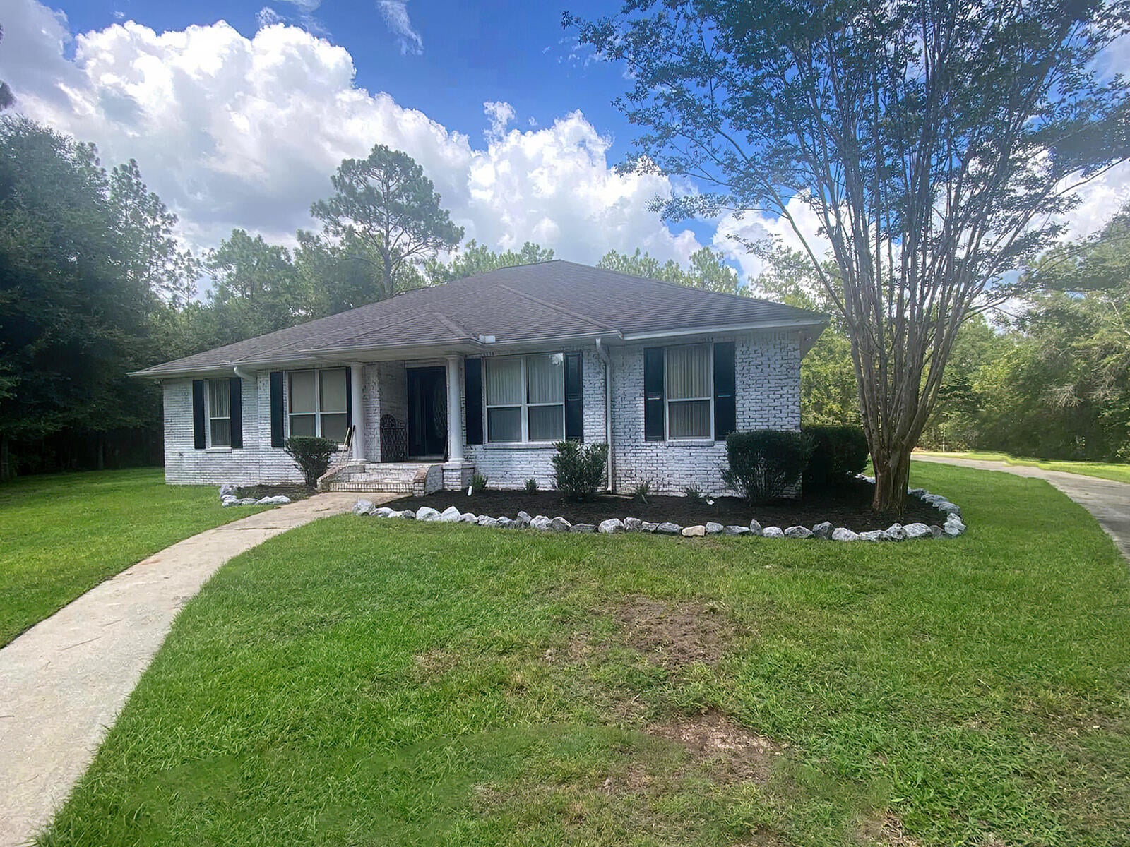 This custom built home on 2.5 acres  is perfect if you are looking for peace and privacy. There is ample space for RV or boat parking. The house features a formal dining room, an office with French doors, a laundry room, and a Jack and Jill bathroom with a double vanity serving the additional bedrooms. The master bath features a separate tub and a walk-in shower. The kitchen comes with all stainless steel appliances. This rental includes quarterly pest control and annual termite inspection. Pets are allowed with breed restrictions. The home will be available September 1.