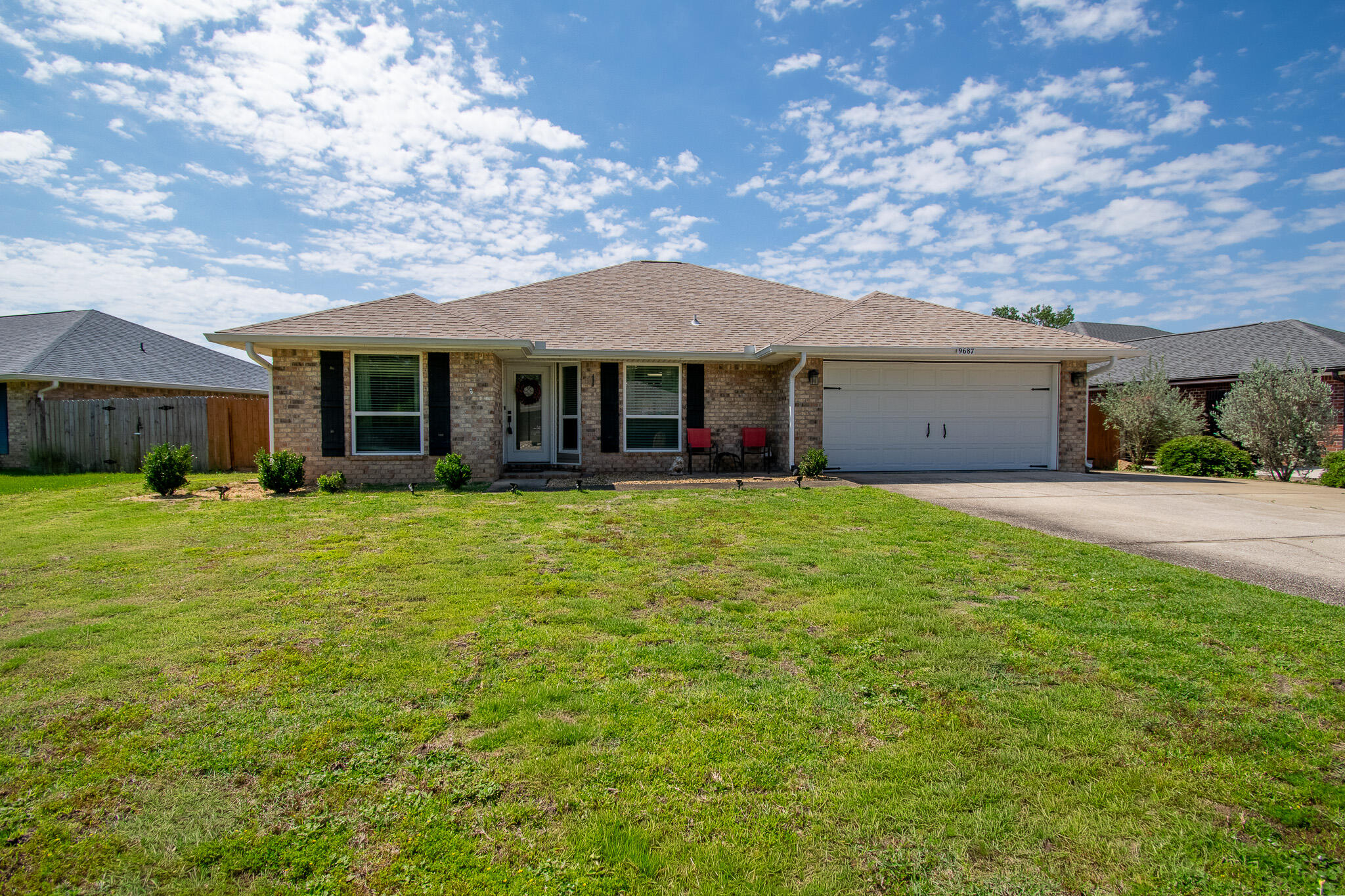 Welcome to this beautiful, move-in ready 4-bedroom, 2-bath home offering approximately 1,950 square feet in the highly sought-after community of Creetwood Place, conveniently located near Hurlburt Field.
This well-maintained home features numerous upgrades and desirable finishes throughout, including elegant travertine flooring in the main living areas and durable luxury vinyl plank flooring in all bedrooms. Ceiling fans are installed throughout the home for added comfort.
The spacious kitchen is equipped with a full stainless steel appliance package, including a refrigerator, smooth-top range, and dishwasher. Granite countertops, abundant cabinetry, and a built-in desk create a functional and stylish space perfect for everyday living. The generously sized great room offers high ceilings and ample space for gathering and entertaining.
The primary suite includes a beautifully updated bathroom featuring a newly tiled walk-in shower, dual closets, and a new vanity with marble countertops. The hall bathroom has also been updated with a new marble-top vanity.
Major system updates provide peace of mind, including all new impact-resistant windows and exterior doors installed in 2021, a new roof in 2024, water heater replaced in 2026, and HVAC system updated in 2018. Additional exterior features include a full gutter system with French drains designed to direct water away from the property, a 24kW Generac backup generator for temporary power restoration during outages, and Fiber Shield hurricane protection. The fully fenced backyard provides privacy and functionality, while the extended concrete driveway, gates on both sides of the home with rear walkways, a 220-volt garage outlet, and an 8x8 storage shed (to convey AS-IS) add even more value to this exceptional property.
This home combines comfort, thoughtful upgrades, and an ideal location--making it a must-see.