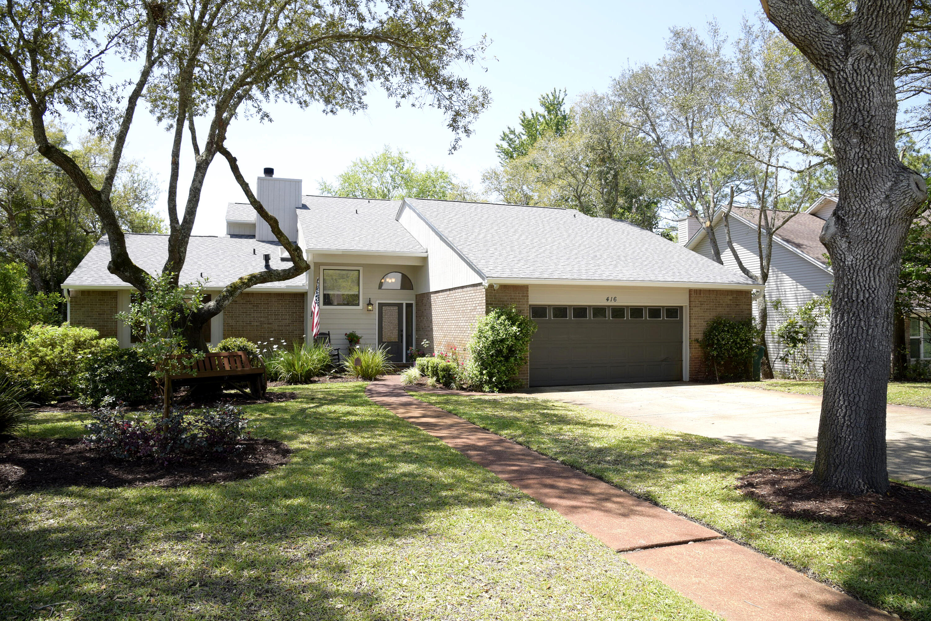 Exquisitely updated 3-bedroom, 2-bath lakefront home located in the highly sought-after Bluewater Bay community. From the moment you enter, you're greeted by elegant marble tile flooring and modern light fixtures that set the tone for the rest of the home. Thoughtful upgrades throughout include rich hardwood floors, updated cabinetry, tall baseboards, and stylish subway tile accents.

The open-concept kitchen has been redesigned for both functionality and flow, seamlessly connecting to the dining area while offering beautiful water views. It features granite countertops, white shaker cabinets, custom pendant lighting, stainless steel appliances, and a spacious walk-in pantry. The inviting living room is highlighted by a charming tiled corner gas fireplace, creating a warm and welcoming atmosphere.

The first-floor master suite is a true retreat, comprised of three distinct spaces: a generous bedroom with sliding glass doors leading to the back deck, a versatile bonus room ideal for an office, dressing area, or media space, and a luxurious en-suite bathroom. The bathroom showcases marbled tile, granite countertops, updated lighting, white shaker cabinets, a walk-in shower, jetted tub, dual vanities, two walk-in closets, and a private water closet.

Upstairs, two additional bedrooms provide ample space, along with a beautifully updated bathroom featuring marbled tile, granite surfaces, a seated walk-in shower, and a convenient linen closet.

Step outside to enjoy the expansive back deck, complete with skylights and stretching the full length of the home--perfect for relaxing and taking in the serene lake views. Even the garage has been upgraded, offering extensive storage with 5-foot-tall cabinets lining an entire wall.

Ideally located near top-rated schools, shopping, Eglin AFB, and the stunning white sandy beaches of Destin, this exceptional home offers both comfort and convenience. Contact us today for a showing!