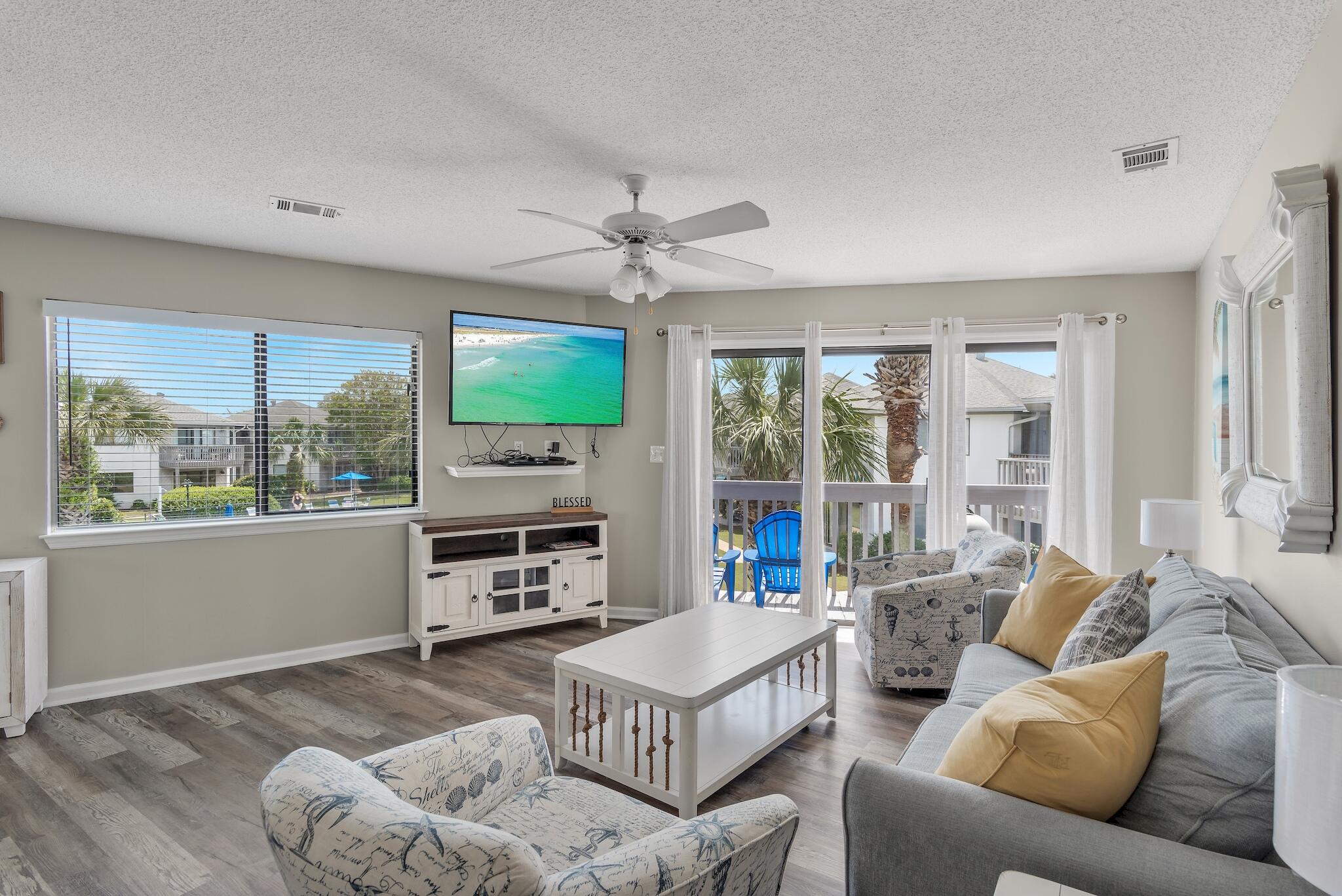 This top floor and fully furnished unit at Crystal Village located just 2.5 blocks from the spectacular South Walton beaches and Pompano Joe's beachfront restaurant!  Enjoy the views with a spacious private deck overlooking perfectly manicured grounds and a community pool, one of two at Crystal Village. This unit is the perfect vacation rental as the second bedroom includes bunks and an owner's closet as well. Crystal Village is perfectly located between Scenic Hwy 98 and the main Hwy 98, with easy access to all of the restaurants, shopping, and of course the world class beaches that this area is famous for! Come take a look. Roof was replaced in 2023 and all new stairways and balconies added in 2025 as well. Buyer to please verify all information.