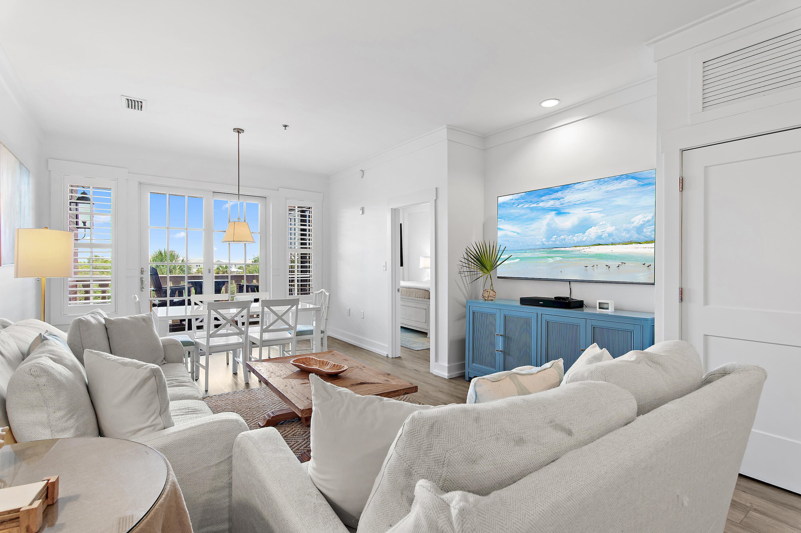 Just Reduced and Best Value in Seacrest for a renovated condo in Seacrest with Gulf View. This  turnkey third-floor, end unit home offers the perfect blend of coastal elegance, modern finishes, and exceptional rental potential in one of the most sought-after locations along 30A. Ideally situated between the iconic communities of Alys Beach and Rosemary Beach, you'll enjoy effortless access to world-class dining, boutique shopping, and the sugar-white beaches of the Emerald Coast. Offering three spacious bedrooms and two beautifully updated baths, this beach-chic retreat is designed for both relaxation and entertaining. The open-concept kitchen is features stunning granite waterfall countertops, a full slab backsplash, stainless steel appliances. Thoughtful upgrades continue throughout the home with luxury vinyl plank flooring, solid-core doors, Recently painted and move-in ready. Step outside to enjoy views of the Gulf and overlook charming Peddlers Pavilion. The deeded beach access is directly across the street. Whether you're searching for a high-performing vacation rental, a second home, or a full-time coastal residence, this exceptional property delivers the location, lifestyle, and investment opportunity that buyers dream of on 30A.