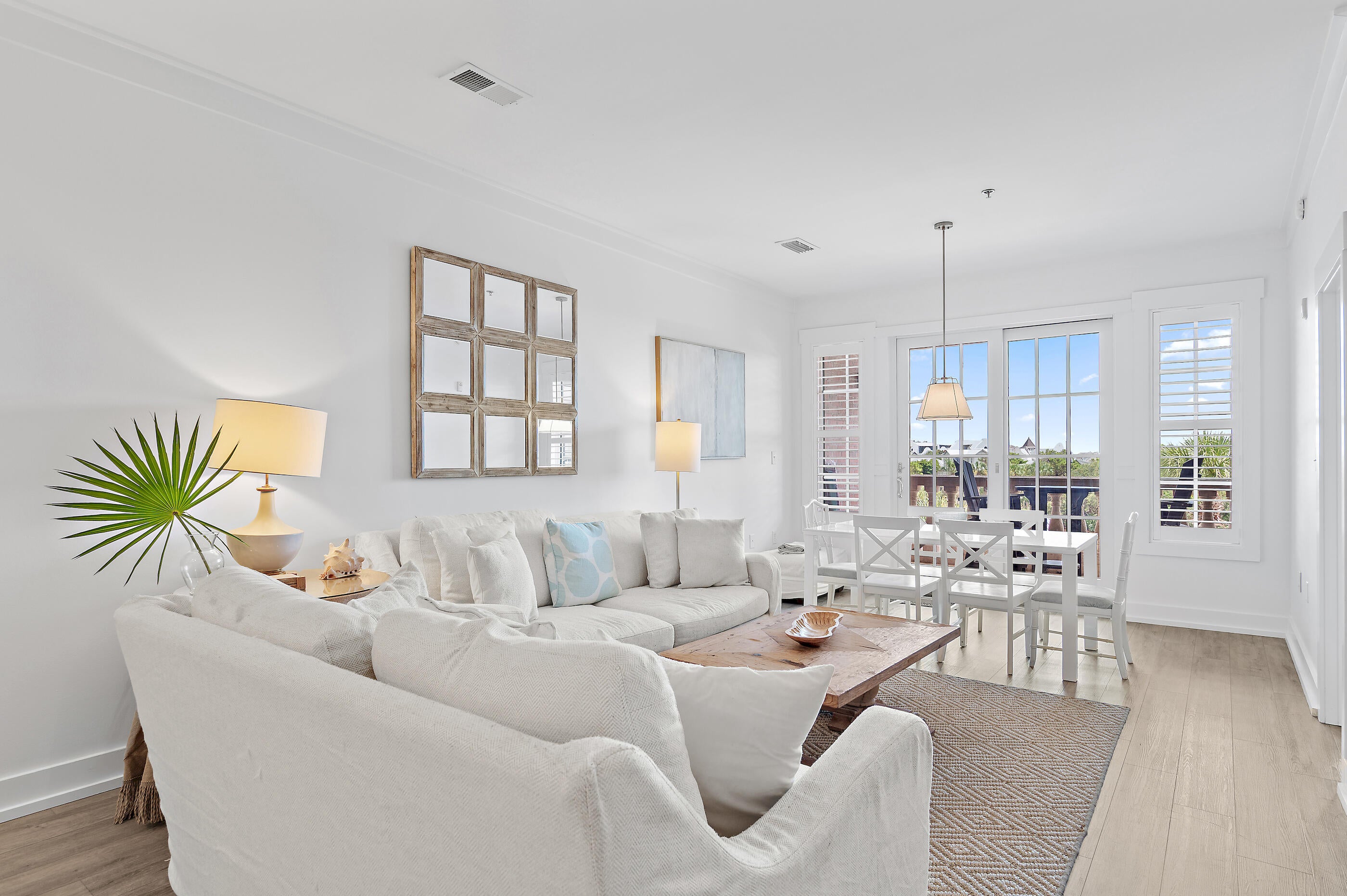 Welcome to your own slice of 30A paradise! This impeccably remodeled, turnkey third-floor residence offers the perfect blend of coastal elegance, modern finishes, and exceptional rental potential in one of the most sought-after locations along Scenic Highway 30A. Ideally situated between the iconic communities of Alys Beach and Rosemary Beach, you'll enjoy effortless access to world-class dining, boutique shopping, and the sugar-white beaches of the Emerald Coast. Offering three spacious bedrooms and two beautifully updated baths, this beach-chic retreat is designed for both relaxation and entertaining. The open-concept kitchen is a showstopper, featuring stunning granite waterfall countertops, a full slab backsplash, stainless steel appliances.Thoughtful upgrades continue throughout the home with luxury vinyl plank flooring, solid-core doors, updated trim, baseboards, and molding, creating a fresh, sophisticated coastal feel. Recently painted and move-in ready, this residence is truly turnkey. The HVAC was replaced in 2019. Step outside to enjoy views of the Gulf of Mexico and overlook charming Peddlers Pavilion, where shopping, dining, and entertainment are just outside your door. The beachaccess is directly across the street. Owners and guests enjoy outstanding amenities, including a large resort-style community pool, relaxing hot tub, and convenient beach tram service.  Whether you're searching for a high-performing vacation rental, a second home, or a full-time coastal residence, this exceptional property delivers the location, lifestyle, and investment opportunity that buyers dream of on 30A.