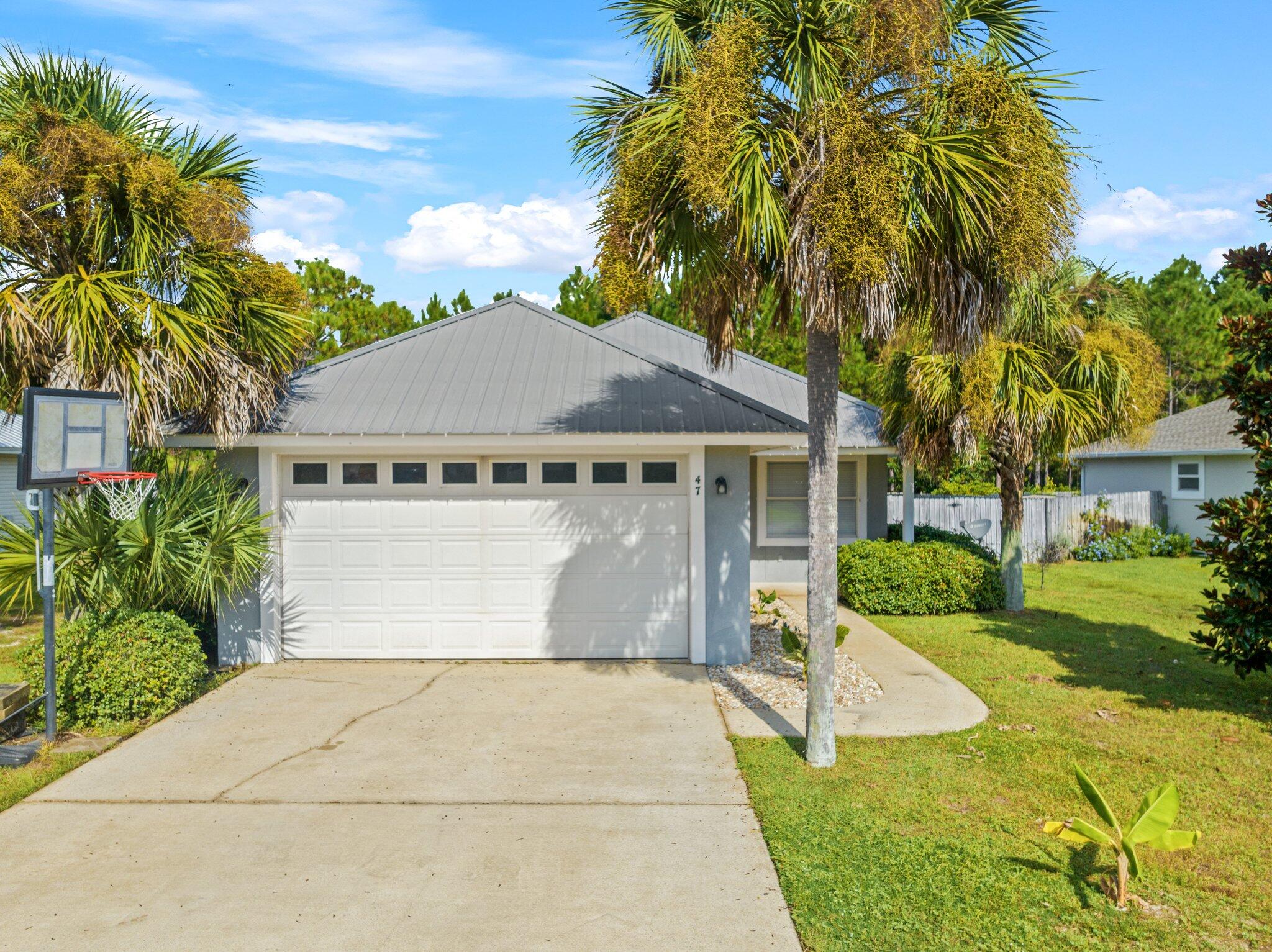 Located at the West End of 30A where you can walk, bike or ride a golf cart to the white sandy beaches or to Topsail Preserve Park with 3 miles of undeveloped beach! This is a very efficient floor plan with spacious great room with 9-foot ceilings, back splash, new lighting and new ceiling fans throughout, carpet, and blinds. The large master comes complete with a large bathroom with granite counter tops, dual vanities and a walk in closet. Large back yard to enjoy the beautiful Florida weather!