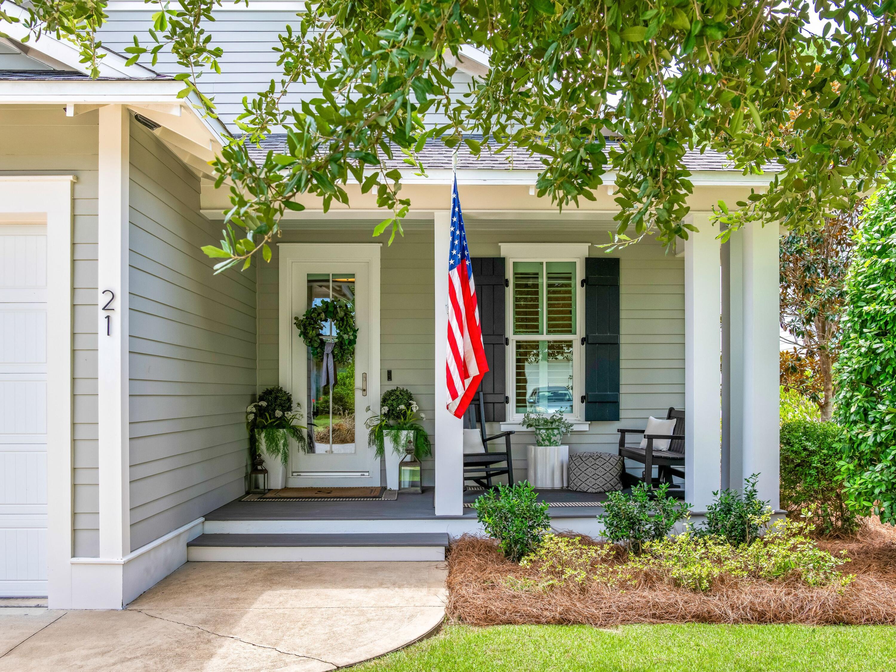 Step into the Watersound lifestyle! Set among the tall pines and white picket fences of Winter Garden, one of the most coveted locations within Watersound Origins, this four-bedroom, three-bath coastal cottage offers refined single-level living minutes from world class beaches and idyllic Scenic Highway 30A.
Gracious porches front and back open to the light-filled interior of this Bayberry plan, built by respected local builder Huff Homes. European white oak floors and plantation shutters throughout, hand-selected lighting fixtures, and a shiplap entry carry a cohesive finish level from room to room. The kitchen is a study in considered detail with white quartz countertops, Frigidaire Professional appliances, a walk-in pantry, and crisp Shaker cabinetry with soft-close hardware - elevated by a microwave drawer set into the island, custom appliance storage, and an added dry bar for entertaining. In the primary suite, a soaker tub and separate frameless glass shower create a private retreat. This expanded floor plan also features a second en-suite bedroom, two additional bedrooms served by a full hall bath, separate laundry room, and ample storage spaces. Outdoors, a generous screened rear porch opens to a custom paver patio framed by lush landscaping, where a picket gate leads to a footpath through wooded conservation land. The piped-gas fire pit anchors cooler coastal evenings, while a gas grill stub makes outdoor meals effortless. Whole-house air purification, a tankless water heater, and a two-car garage with built-in cabinetry and push-button attic lift complete a home where every practical detail has already been considered.
And the best of Watersound Origins is only a short walk from the front door - the amenity center with golf, resort-style pool, fitness center, and tennis and pickleball courts. Winter Garden pocket parks, event lawns, and dense pine canopy give this area within Origins a texture that newer developments haven't had time to earn. Residents enjoy miles of paved walking and biking trails throughout the neighborhood, along with community kayaks and dock access on Lake Powell, one of only a handful of coastal dune lakes on earth.
At the community entrance, Watersound Town Center - St. Joe's open-air lifestyle center - places Publix, Starbucks, chef-driven dining, boutiques, and medical and professional services minutes away by cart or bike, with new national retailers opening and further expansion underway. Scenic Highway 30A lies approximately two miles south via a dedicated multi-use path, putting the Emerald Coast's sugar-white sand, Alys Beach, Rosemary Beach, and 30Avenue within easy reach.
Move-in ready, exactingly finished, and backing to preservation in one of Northwest Florida's most desirable enclaves. The lifestyle is already here. All that remains is claiming it.
