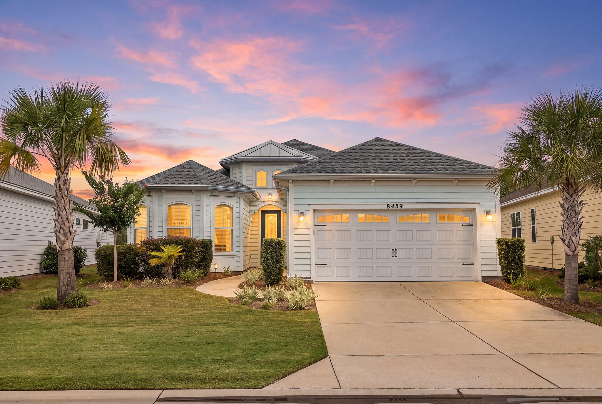 Privacy, water views and an especially convenient location come together in this popular Parrot floor plan in Phase 2 of Latitude Margaritaville Watersound. 

Set on a premium homesite, the property overlooks a wide grassy backyard, peaceful pond and wooded preserve beyond, creating a private backdrop with no homes directly behind you. The screened lanai makes the most of the setting, with plenty of room to relax, dine outdoors and enjoy the view.

Inside, the home features two bedrooms plus a versatile den that can easily function as a third bedroom, office or additional living space. Luxury vinyl plank flooring runs throughout the home, complemented by quartz countertops, soft-close cabinetry, a custom tile backsplash and upgraded lighting and finishes. The kitchen is also equipped with a gas connection for those who prefer a gas range.

The spacious primary suite is positioned to take advantage of the view, with an expansive bay window and sitting area overlooking the water. Dual closets provide generous storage, while the primary bath features a large vanity, oversized shower, upgraded tile and upgraded countertops. The large laundry room adds useful workspace and storage, with granite countertops and a Speed Queen washer and dryer set. A full two-car garage and private driveway add to the home's everyday functionality. Its location near the neighborhood entrance also makes getting in and out of the community especially convenient, while the Publix and additional retail planned nearby will put groceries, shopping and everyday essentials just minutes from home.

With its waterfront and preserve views, flexible floor plan, thoughtful upgrades and easy-access location, this home offers a particularly appealing combination of privacy and convenience within Latitude Margaritaville Watersound.

Latitude Margaritaville Watersound offers an active 55+ lifestyle centered around an impressive collection of amenities, including the Latitude Town Square with live entertainment, resort-style Paradise Pool, fitness center, pickleball and tennis courts, Barkaritaville dog park, walking and biking trails, and on-site dining. With a full calendar of activities, clubs and events, the community makes it easy to be as social, active or relaxed as you choose, all within a short drive of the beaches, dining and recreation of Panama City Beach and the surrounding area.