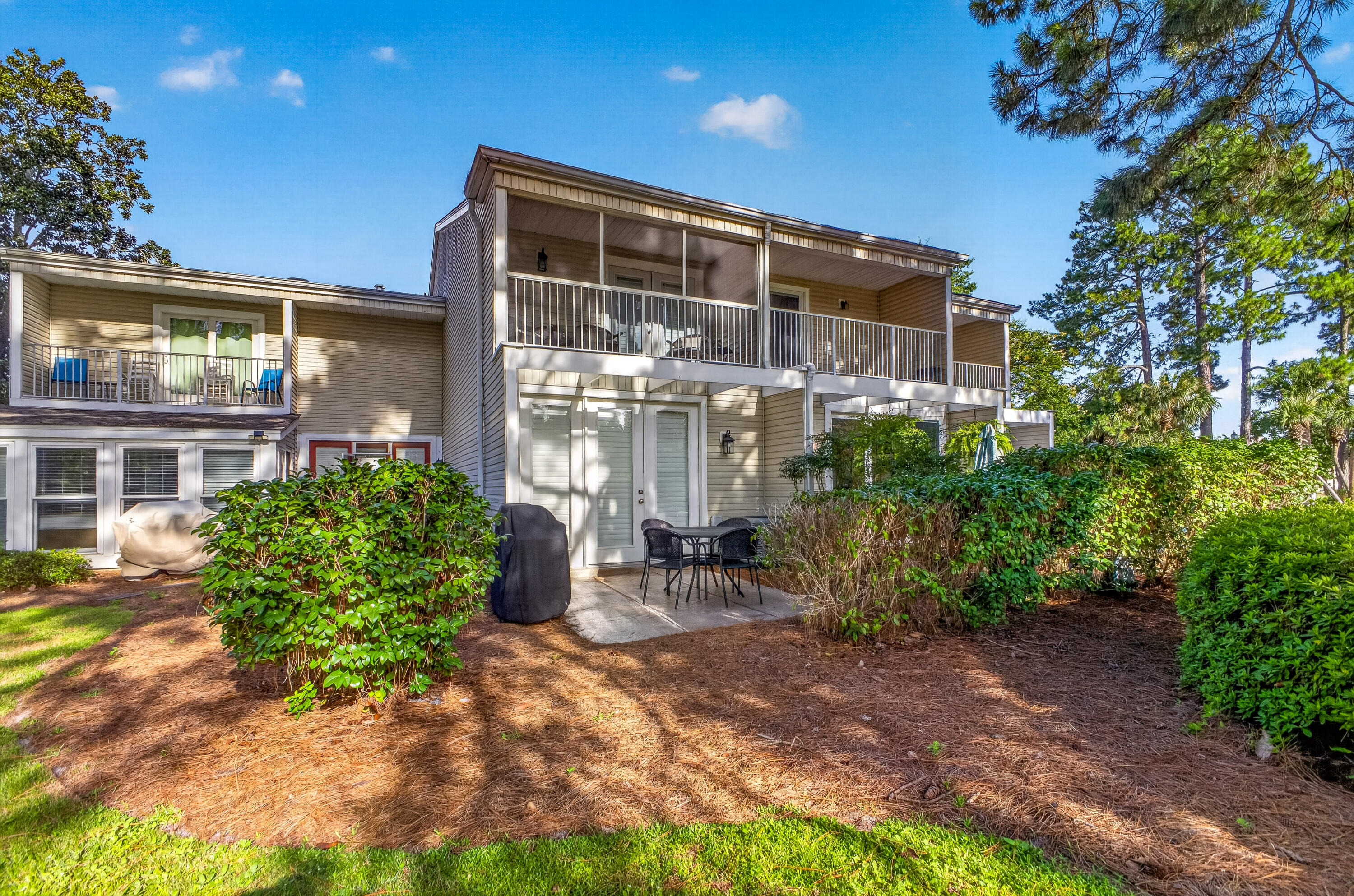 Beautifully updated throughout, this immaculate townhome-style condo offers an exceptional golf course setting overlooking the picturesque 12th hole of The Links Golf Course. High-end finishes include hardwood floors, crown molding throughout, stainless steel appliances, updated bathrooms, and a convenient laundry area with a full-size washer and dryer.

The spacious primary suite opens to a private screened balcony with peaceful golf course views, while the large patio provides the perfect setting for grilling, entertaining, or simply relaxing as you watch golfers finish the 12th hole. Abundant outdoor storage provides plenty of room for beach gear, bicycles, and golf equipment.

Conveniently located near the front entrance of the resort for easy access in and out, this move-in-ready home combines stylish upgrades, a prime golf course location, and the relaxed resort lifestyle buyers are looking for. Sandestin Golf and Beach Resort features more than seven miles of beaches and pristine bay front, four championship golf courses, 15 world-class tennis courts, a 226-slip marina, a fitness center, and spa. Shop, dine and play at the charming pedestrian village, The Village of Baytowne Wharf and more. Inside the gates of the resort, residents enjoy a balanced lifestyle of high-class living, spanning the 2,400 acres from the beach to the bay. Everything within the gates of the resort is accessible by golf cart or bicycle. The entire resort is interconnected by miles of pedestrian, bike and golf cart paths that weave through groves of live oaks, meandering past natural lagoons, fountains, man-made lakes, and meticulously landscaped fairways.