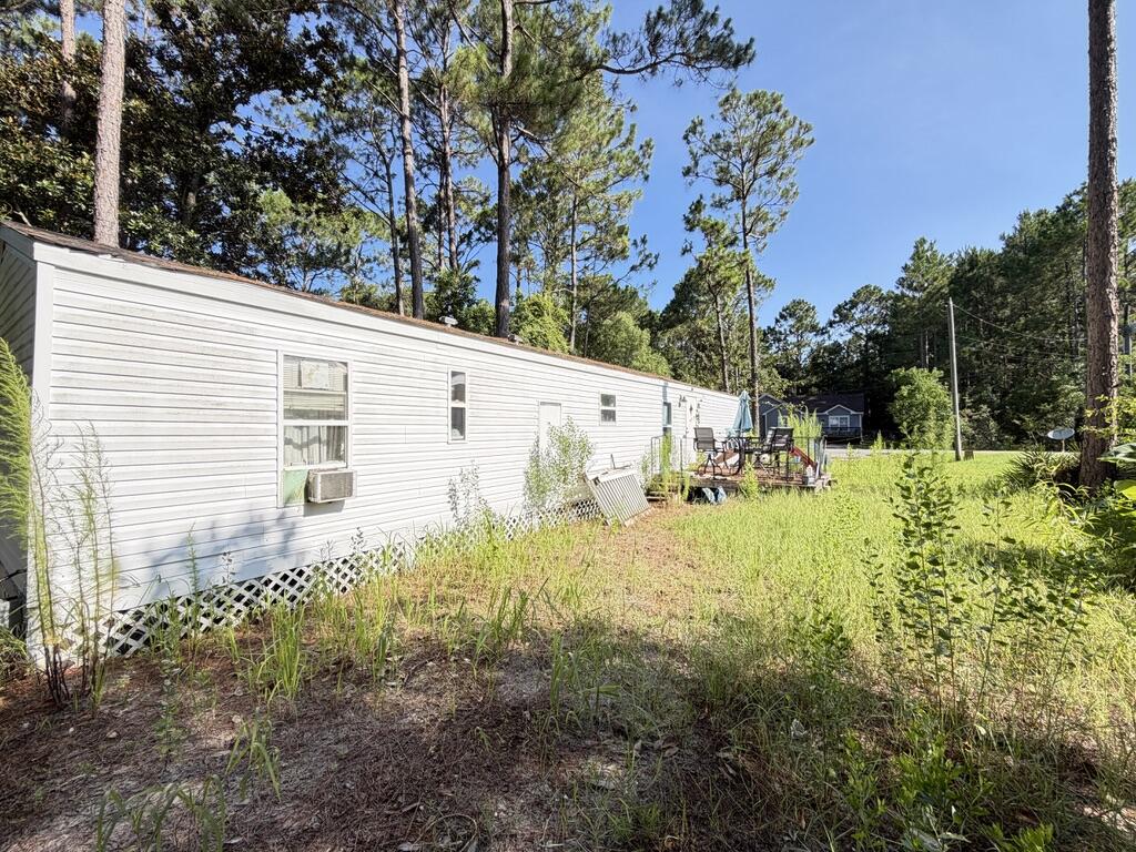 Investment Opportunity in the Heart of Santa Rosa Beach!
Don't miss this chance to own an affordable property in one of Santa Rosa Beach's most sought-after locations. Nestled on a spacious lot at the end of a quiet cul-de-sac, this property is just approximately ½ mile from Highway 98 and about 2 miles from the sugar-white beaches and emerald waters of the Gulf Coast.

The existing mobile home is being sold as-is and will require repairs, updating, and cleaning, making it an ideal opportunity for investors, flippers, or buyers looking to customize a property to their own vision. With its prime location and generous lot, the possibilities are endless.

Enjoy easy access to shopping, dining, schools, entertainment, and everything Santa Rosa Beach has to offer, all while tucked away on a peaceful, low-traffic street.
Whether you're looking for your next investment project, a weekend getaway, or a place to build equity, this property is full of potential. Opportunities like this in Santa Rosa Beach are becoming increasingly hard to find.
