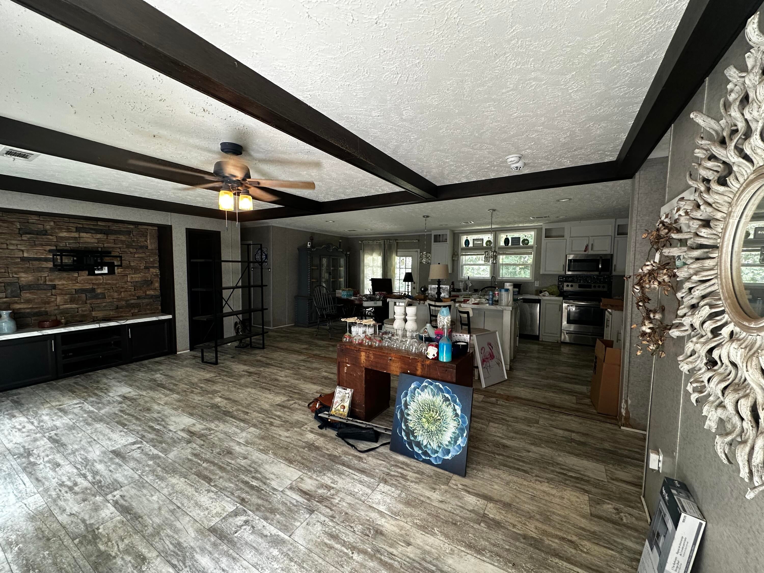 Nestled in a peaceful, unhurried pocket of Holt, Florida, this 2020-built home offers the ultimate retreat from the hustle and bustle. Set on a desirable 0.72+/-acre lot, you will enjoy country quiet and low-traffic surroundings--yet everyday conveniences are remarkably close. Drive just 10-15 minutes down US-90 to access Crestview's dining, retail, and shopping centers, or jump right onto I-10 for effortless weekend beach trips to Navarre Beach and Pensacola.

Step inside to an expansive 1,596-square-foot open floor plan bathed in natural light--thoughtfully designed for both daily living and entertaining. Highlights include generously sized bedrooms and a private primary suite featuring a full bath with a deep soaking tub and separate shower. Outside, your partially fenced backyard provides the perfect setup to relax, garden, or host under open Florida skies with room to breathe.