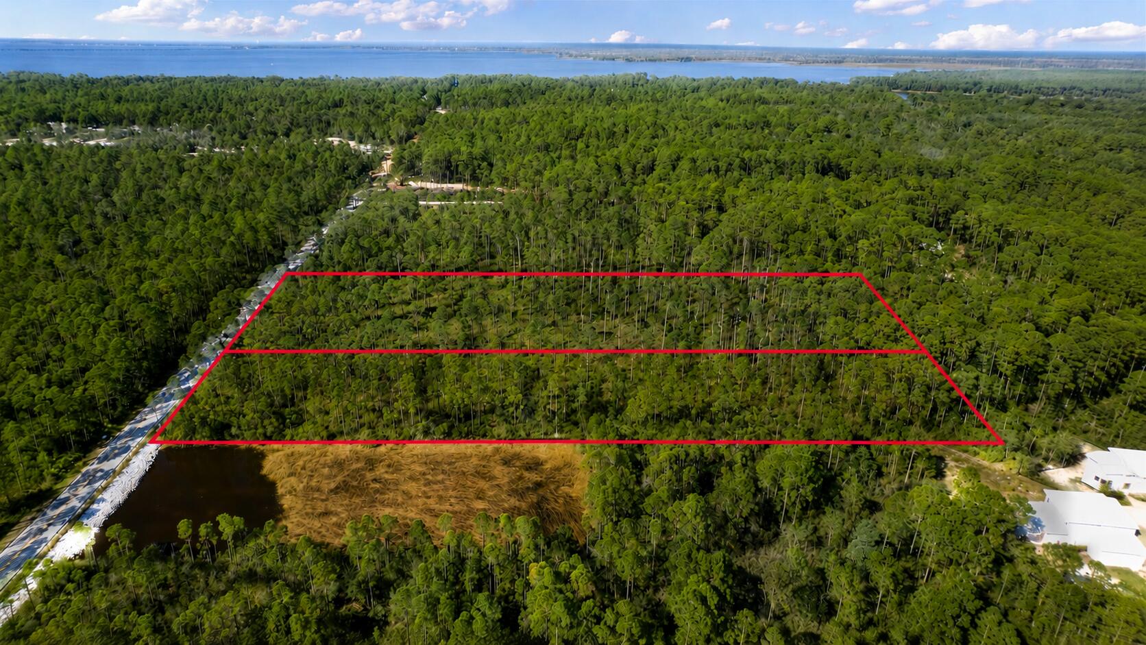 BLANK CANVAS AND SUPER VERSATILE ! 4 SINGLE FAMILY LOTS, 2 SINGLE FAMILY LOTS OR A 12 TOWNHOME COMMUNITY. Welcome to this incredible opportunity to own 6.38 acres of prime development land. Nestled in the heart of Point Washington, this expansive prime development land offers endless possibilities for investors, developers, and visionaries. Offering you a tranquil, quiet and serene environment, while still being conveniently close to all the amenities and attractions 30A has to offer. Previously had approved Development Order for 12 Townhome community.  Don't miss out on this chance to acquire a significant piece of Point Washington's future. Whether you're a developer with a grand vision or an investor seeking prime real estate, this 6.38 acre property is a rare find. All documents can be provided upon request
