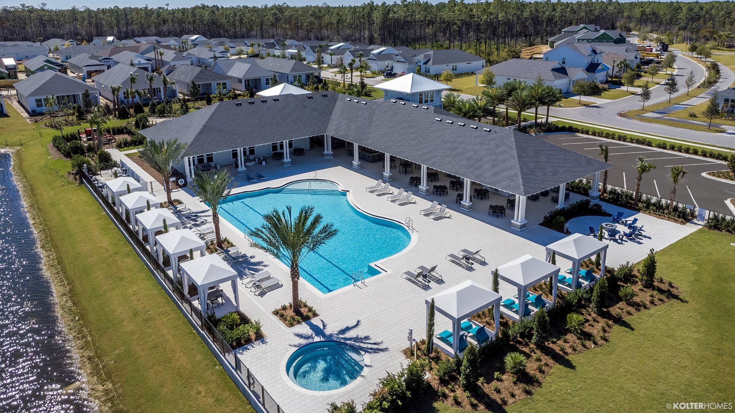 Brand-new, never-lived-in single-story home by Kolter Homes in the gated NatureWalk neighborhood of WaterSound Origins -- two miles from the beaches of Scenic 30A, in a golf-cart-friendly community. This home offers 3 bedrooms and 2 baths across 1,674 sq ft, with the den built out as a true third bedroom. Offered unfurnished and completely move-in ready, with custom window treatments, ceiling fans, and designer lighting throughout, plus two brand-new mounted flat-screen TVs, including a 79'' on the covered lanai.
 

The kitchen is upgraded with a GE Café appliance package, a 36'' gas cooktop, and an upgraded range hood. Thoughtfully designed for outdoor living, the home features a very private fully fenced backyard, an extended 20' x 30' paver patio (600 sq ft), and a covered lanai with a privacy wall and motorized screen-- all overlooking a tranquil pond   preserve and sunset view. There is anHOA easment to your west increases your privacy. A two-car garage completes the home.

Keeping everything lush is effortless and worry-free: the automated, timer-based sprinkler system runs on reclaimed (non-potable) water and is covered by the owners HOA payments-- so there's no large water bill to keep the lawn and landscaping green. The owner pays all HOA dues and lawn care; the tenant pays only utilities and internet.
Resort amenities are included at no extra charge: NatureWalk's resident-exclusive Gathering Place -- beach-entry resort pool, hot tub, fitness center, tennis, and pickleball -- plus the full WaterSound Origins amenities operated by St. Joe, including unlimited golf at Origins Golf Club, an additional resort pool, tennis and pickleball, soccer,and Lake Powell access with kayaks and paddleboards.  
Move-in ready and truly turnkey -- window treatments, lighting, fans, and mounted TVs already in place, with HOA, resort amenities, and lawn care all handled. Just settle in and enjoy the 30A lifestyle, whether you're relocating to the area or living here while you build nearby.

Zoned for Dune Lakes Elementary, Emerald Coast Middle School, and South Walton High School. WaterSound Town Center's shopping and dining is a short golf-cart ride away.

Small Dogs are considered on a case-by-case basis and must be approved in writing. If a dog is approved, a $500 refundable pet deposit will be required before move-in.

Offered at $4,500/month as an annual (12-month) rental; six-month term considered. Easy online application with background and credit screening through RentSpree -- a quick soft credit check that does not affect your credit score.