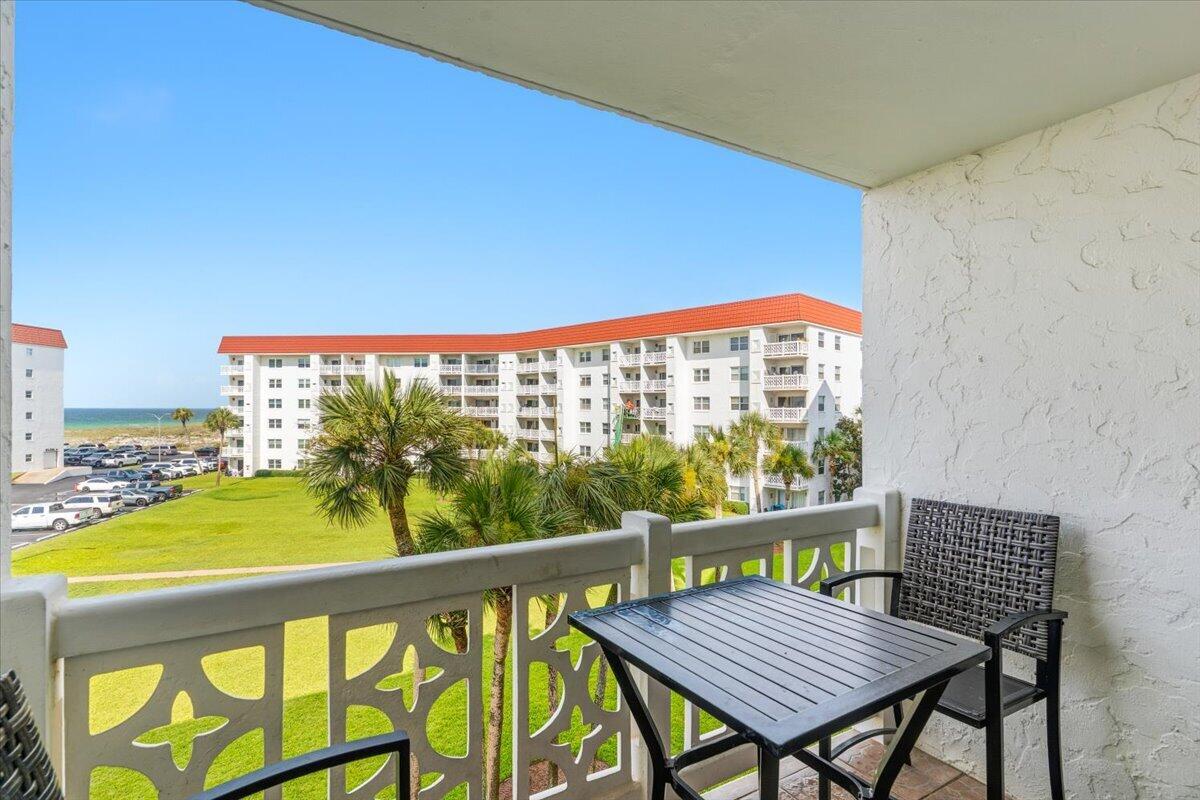 If you have been waiting for a slice of paradise your wait is over! This beautiful 2 bedroom 1 bath and a half Condo is just what you have been  waiting for. Convenient to the beach with the sugar white sand of the Gulf just a short walk away. both pools, the Tennis/Pickleball courts and the recreation building. This unit has been renovated to include new Granite countertops in the kitchen that is bright and cherry. equipped with all you will need. Relax in the large Living room that looks out over the Emerald Green Waters through your sliding glass doors or go out on to the balcony and enjoy a cool beverage and enjoy the view. The Master Bedroom has a large walk in closet and separate vanity away from the shower/tub area.
Guest Bedroom has two single beds for added space and a second bathroom with vanity for washing up before dinner or bed for added convenience. Living room has pullout sofa for extra sleeping space and a fireplace for  those cool Florida nights.SELLER IS OFFERING A $2500.00  Improvement Credit given at Close!!!
THIS IS A MUST SEE!!! El Matador offers two Pools one heated in the cooler months and 11+ acres luscious green landscaping 24/7 gate guard two lounges that can be used by our owners for a small fee.
You will find views of the sound and the gulf, don't let this unit become someone else's dream come true. call today.