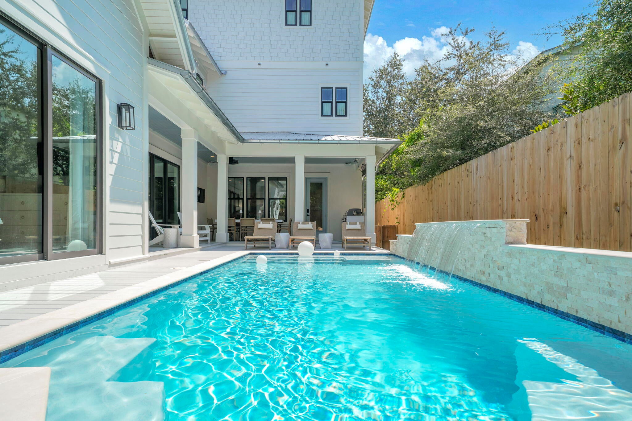 South of 30A in Seagrove Beach, this six-bedroom custom home is built for the way a coastal home is actually used. Every bedroom is a private ensuite with a beautifully designed bath, so each guest is equally well placed. Two laundry rooms and a home office handle a long stay and a bonus sitting room, and multiple balconies give plenty of outdoor space too.

Approximately 1,700 square feet of decks and balconies wrap the home: morning coffee, Gulf breezes, an open starry sky and gorgeous sunsets. The private pool sits within a generous deck and entertaining area, in view from the kitchen, dining, bedroom suite and living rooms.

Location is the quiet advantage of a wonderful neighborhood. The Eastern Lake boat launch is a few blocks away, the shops and restaurants at Greenway Station three blocks northwest. Parking, so often the constraint here, is not: a two-car garage plus five more spots in the drive.

Perfect Second home, primary residence with garage and storage spaces or rental investment to enjoy as well.