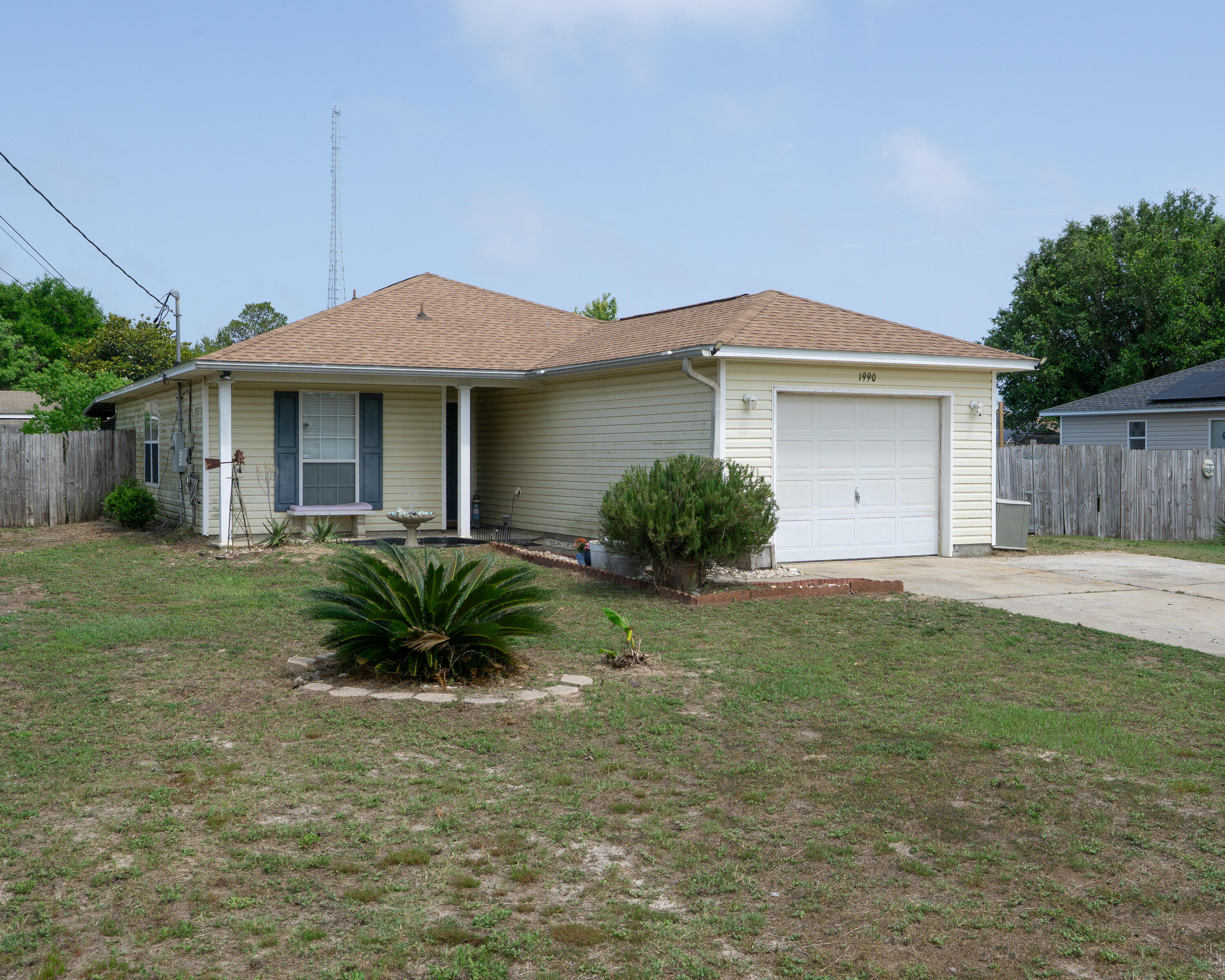 Motivated Seller!! Come take a look at this affordable home close to the beach with an adorable little coy pond and fountain to greet you at your front steps!This home is located near the gulf, the sound, shopping and restaurants! Enjoy a fenced in back yard, plenty of parking and a one car garage. New roof in 2024, 10X12 back porch, storage shed. Washer and dryer convey with sale. Come take a look!