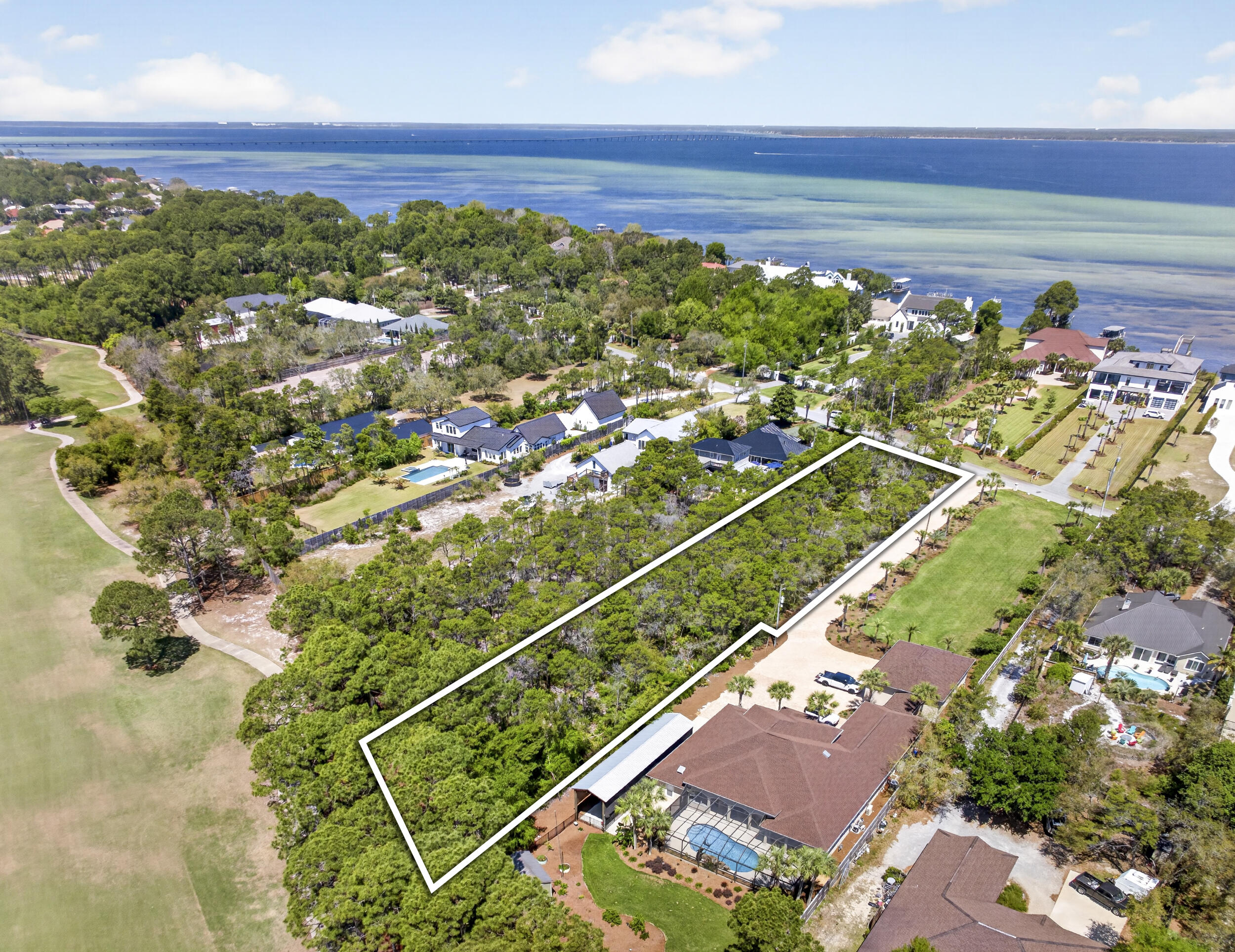 DON'T LET THIS ONE GO UNNOTICED. 1.1 acre lot in Miramar Beach. No HOA. Great surroundings. Get to the beach by golf cart! Lot backs up to Emerald Bay Golf Course. Great location for primary or second home. Call now for more information.