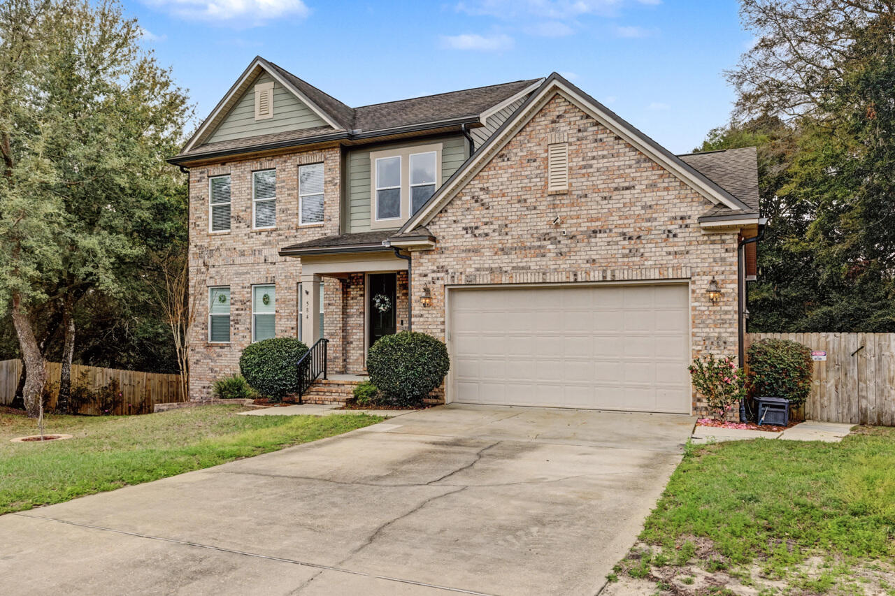Step into this spacious and beautifully designed 5-bedroom, 3.5-bath home that offers the perfect blend of comfort, functionality, and outdoor living with thoughtful details throughout The main level features an inviting layout with the kitchen and comfortable living and dining areas that lead out to a screened in porch as well as the Master Suite with its own private bath and walk in closet. The upstairs includes three bedrooms and full sized bathroom. The finished walk-out basement includes a bedroom, bathroom, seating area and kitchenette.  It seamlessly connects indoor and outdoor living, providing easy access to the backyard.  Step outside to enjoy a cozy fire pit area ideal for relaxing evenings.  There is also an outbuilding that offers extra storage or workshop potential. The home is conveniently located to Eglin AFB, Duke Field and local beaches. With its spacious design, finished basement and inviting outdoor features, this home is a rare find that truly has it all.  Call to schedule a showing today.