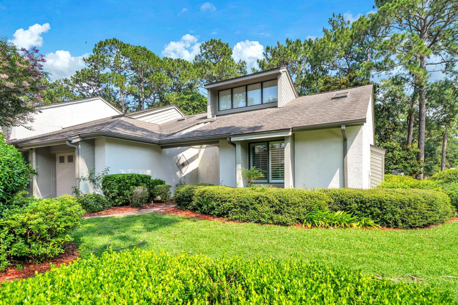 This charming two-bedroom, two-bathroom, single-level home features a functional and spacious floor plan, offering a contemporary feel with vaulted ceilings and abundant natural light throughout. Perfect for entertaining, the home is located on the 2nd hole of the Bay Golf Course. It includes a large living room with a stone fireplace, a formal dining room, an informal dining area off the ample kitchen (which features stainless appliances), and a separate sunroom overlooking the golf course. The property also includes a single-car garage and is well-situated within the Gleneagles community. Bluewater Bay offers resort-style amenities, including swimming pools, a tennis center, pickleball courts, walking trails, and access to golfing, sailing, yachting, fishing, and other water sports. It is within walking distance to the Blue Tee Restaurant and near the LJ Schooners Dockside Restaurant & Oyster Bar. Additionally, it is conveniently located close to hospitals, shopping, and local activities, and is just 12 minutes away from the beautiful white sand beaches of Crystal Beach in Destin, Florida.