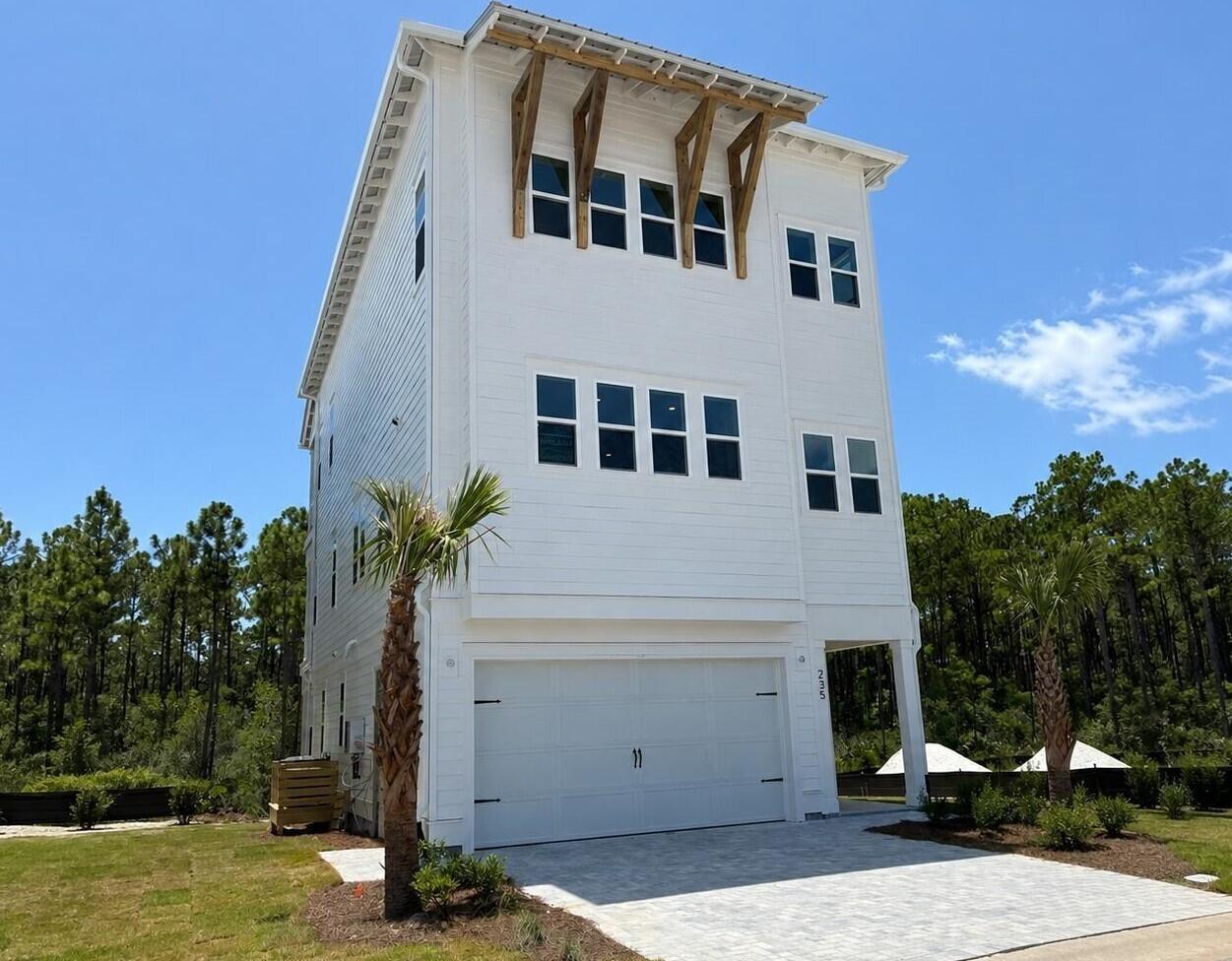 Welcome to 235 Ashwood Drive, a new coastal luxury home under construction at Parkside located in Santa Rosa Beach, Florida. Discover refined coastal luxury in this beautifully designed three-story home featuring four bedrooms, four bathrooms, and elevated living spaces on every level. Thoughtfully crafted for comfort, style, and functionality, this coastal residence offers a balcony on each floor, bringing in natural light, fresh ocean breezes, and a true indoor-outdoor lifestyle. The main level features the first of two primary bedroom suites, complete with a spacious walk-in closet and a large, spa-inspired shower. This level's private balcony creates the perfect retreat for relaxing mornings or peaceful evenings. The second level serves as the heart of the home, offering an open and inviting layout ideal for entertaining. A gourmet kitchen with premium finishes flows seamlessly into the living and dining areas, creating a bright and airy central gathering space. This level also includes a powder bath and a dedicated laundry room, along with its own balcony to enhance the coastal living experience.



On the third level, you'll find the second primary bedroom suite, featuring a generous walk-in closet, an oversized luxury shower, and access to the top-floor balcony with elevated coastal views. Two additional guest bedrooms share a well-appointed bathroom, making this floor perfect for family, visitors, or flexible lifestyle needs.



Designed for those seeking the ultimate coastal luxury lifestyle, this elegant three-story home offers exceptional privacy, modern design, and versatile living spacesall complemented by balconies on every level and thoughtful details throughout.

Images are of model home and may include custom design features not available in other homes. Furnishings and decorative items are not included with home purchase. For more information about this floor plan, contact a D.R. Horton Sales Representative.