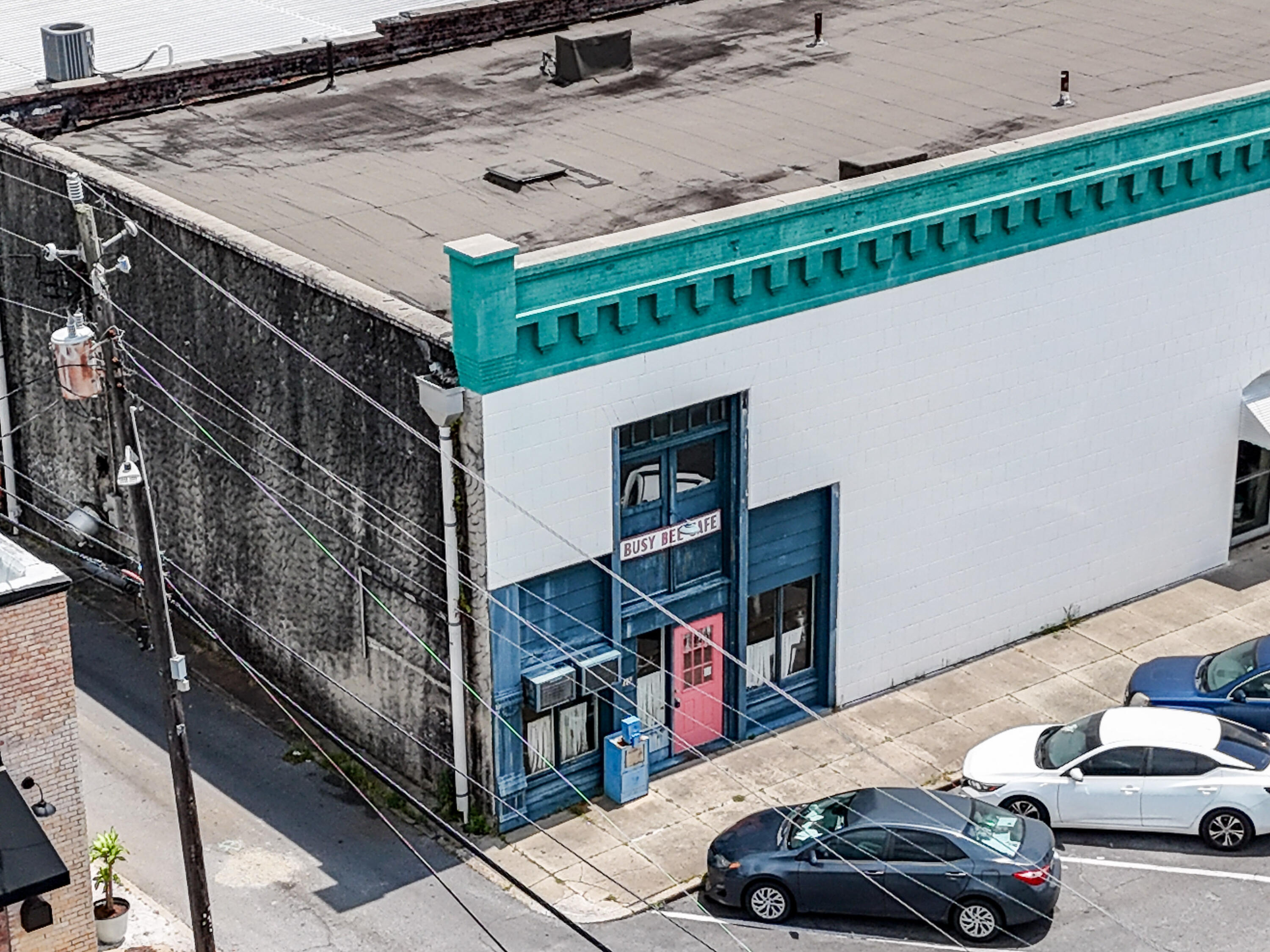 Here's your chance to own a piece of downtown DeFuniak Springs history, formerly home to the beloved Busy Bee Cafe, and step into the market at an entry point no longer found...offering a rare affordable foothold in downtown.

At appx 1,000SF, this building is not turnkey. Not even close. It needs vision, investment, and a full-scale renovation, including roof and likely electrical, plumbing and more. But for the right buyer, that is exactly the opportunity.

At just $145,000, this is the kind of property that allows an entrepreneur, investor, or dreamer to get their foot in the door downtown without a seven-figure budget. Located on 7th St with alley access and less than one block to the lake. Whether you envision a boutique, studio, office, or something entirely your own, the bones of po Here's your chance to own a piece of downtown DeFuniak Springs history, formerly home to the beloved Busy Bee Cafe, and step into the market at an entry point no longer found...offering a rare affordable foothold in downtown.

At appx 1,000SF, this building is not turnkey. Not even close. It needs vision, investment, and a full-scale renovation, including roof and likely electrical, plumbing and more. But for the right buyer, that is exactly the opportunity.

At just $145,000, this is the kind of property that allows an entrepreneur, investor, or dreamer to get their foot in the door downtown without a seven-figure budget. Located on 7th St with alley access and less than one block to the lake. Whether you envision a boutique, studio, office, or something entirely your own, the bones of possibility are here.